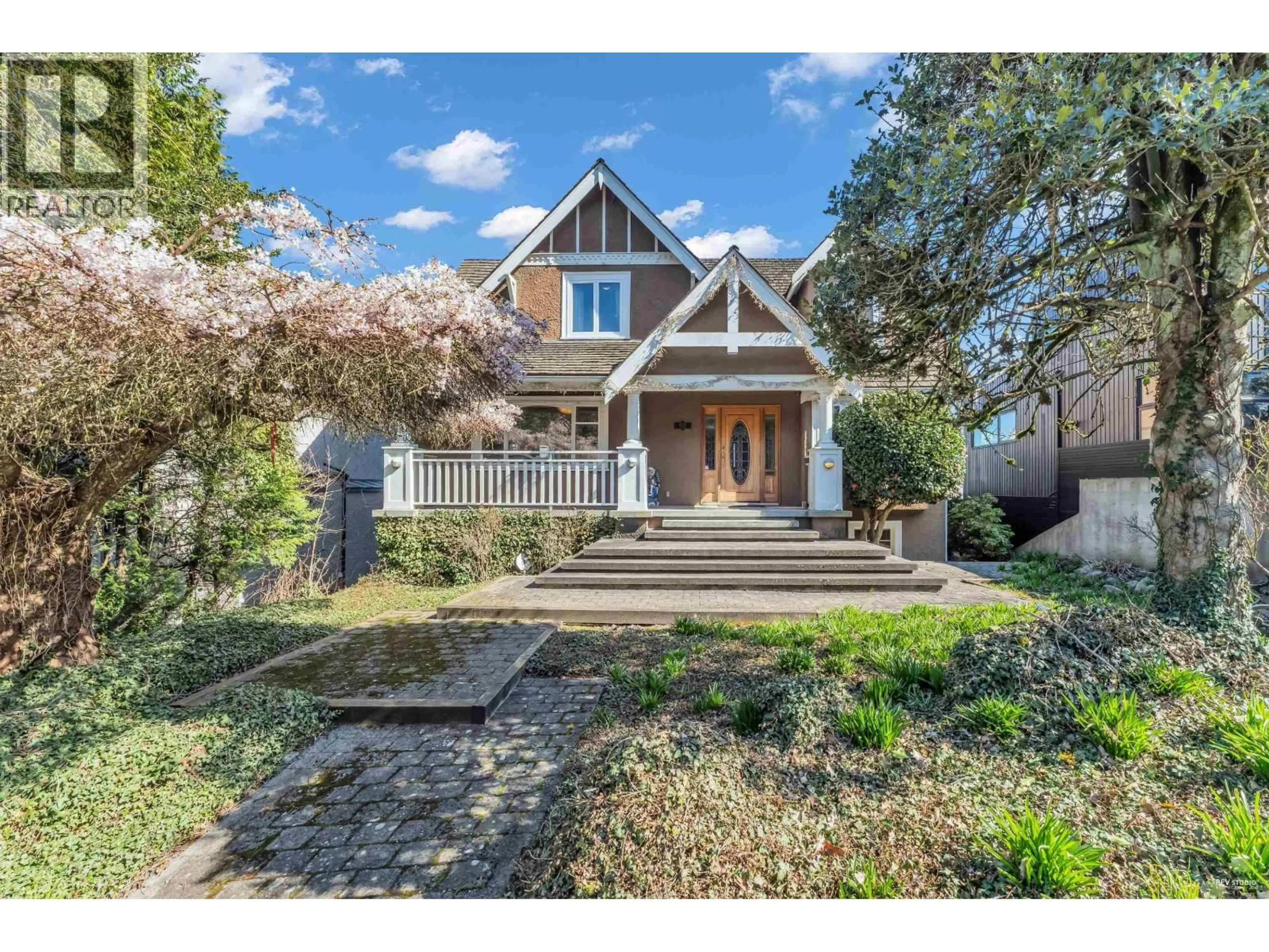 Home with brick exterior material, street for 4389 LOCARNO CRESCENT, Vancouver British Columbia V6R1G2