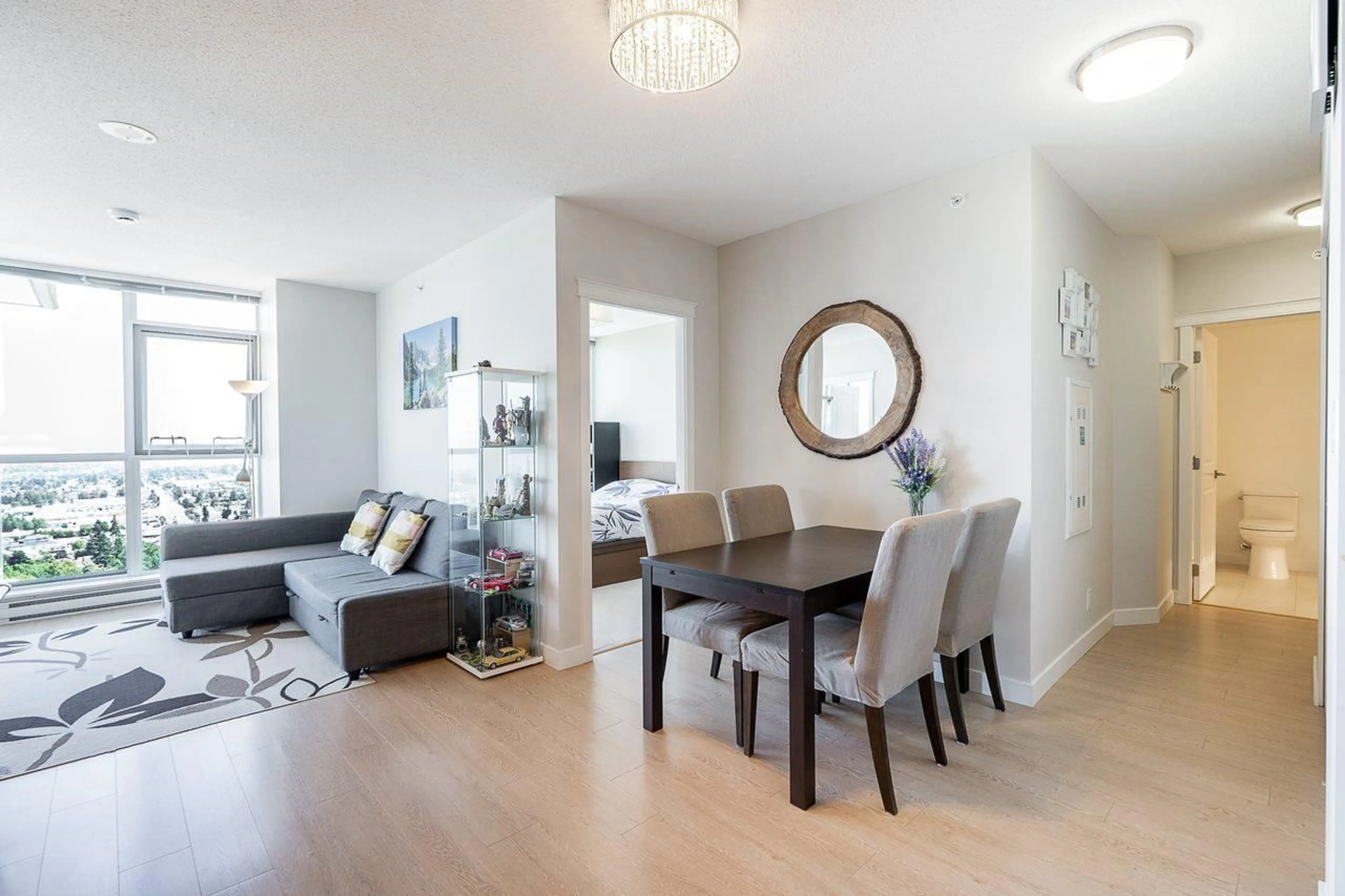 Living room with furniture, wood/laminate floor for 3206 - 11967 80 AVENUE, Delta British Columbia V4C0E2