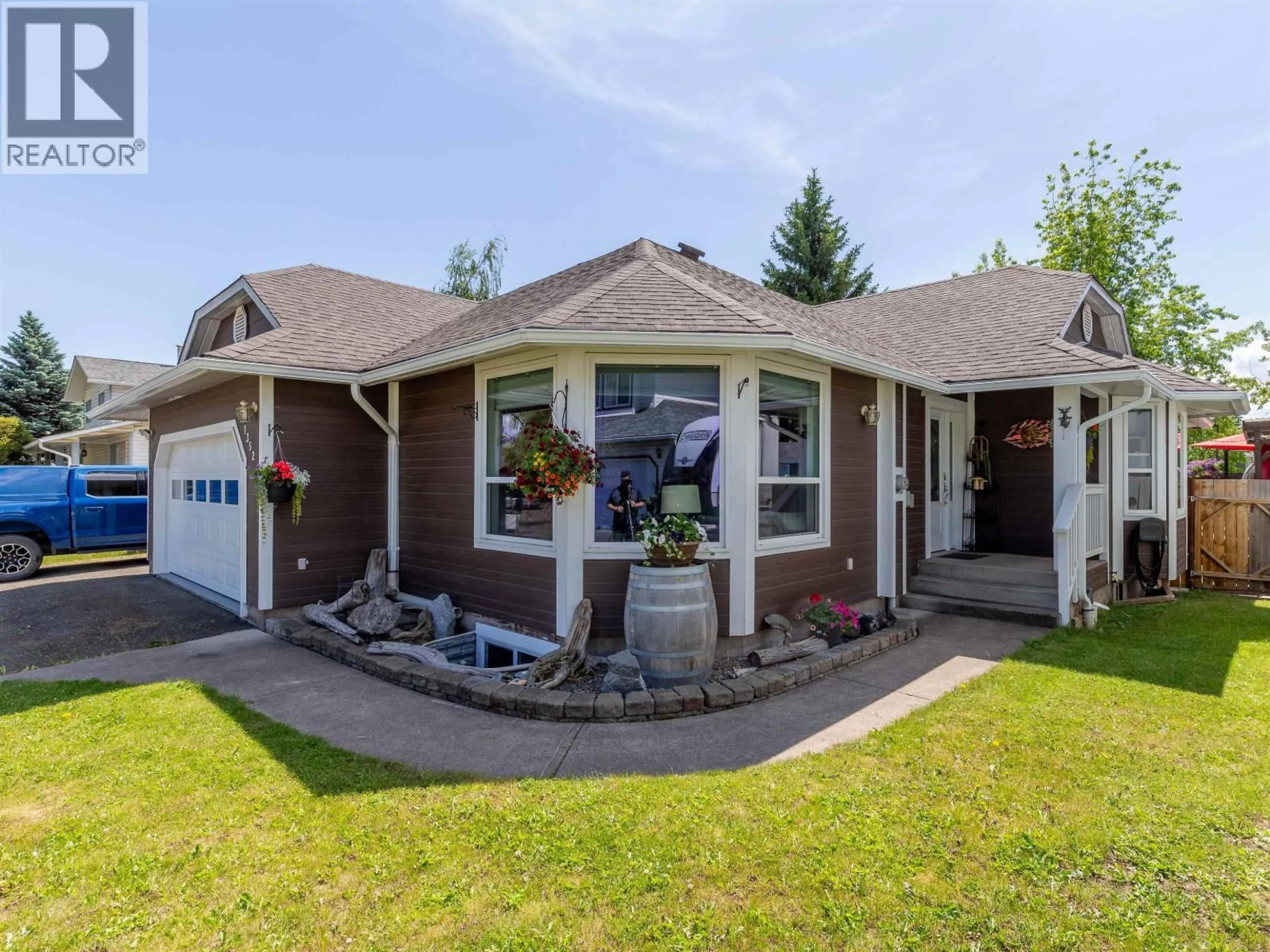 Home with brick exterior material, street for 1352 CRONIN PLACE, Smithers British Columbia V0J2N0