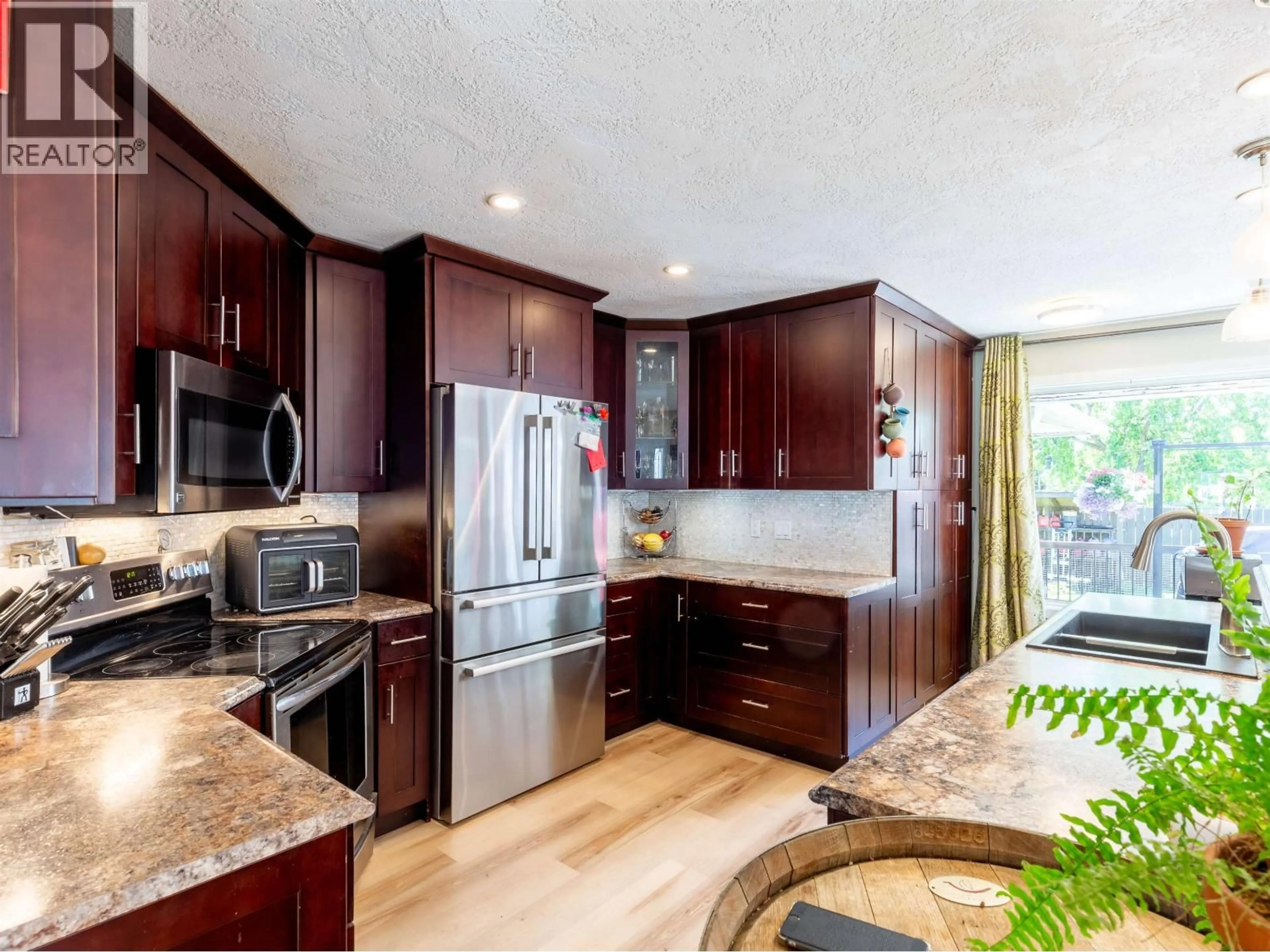 Open concept kitchen, unknown for 1352 CRONIN PLACE, Smithers British Columbia V0J2N0