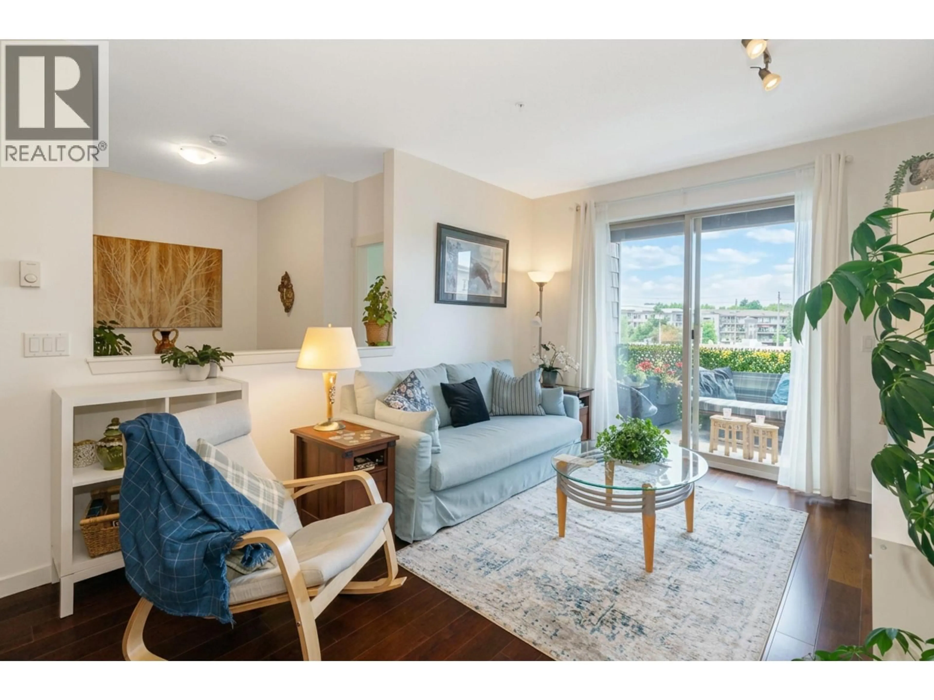 Living room with furniture, wood/laminate floor for 310 - 2336 WHYTE AVENUE, Port Coquitlam British Columbia V3C0A7
