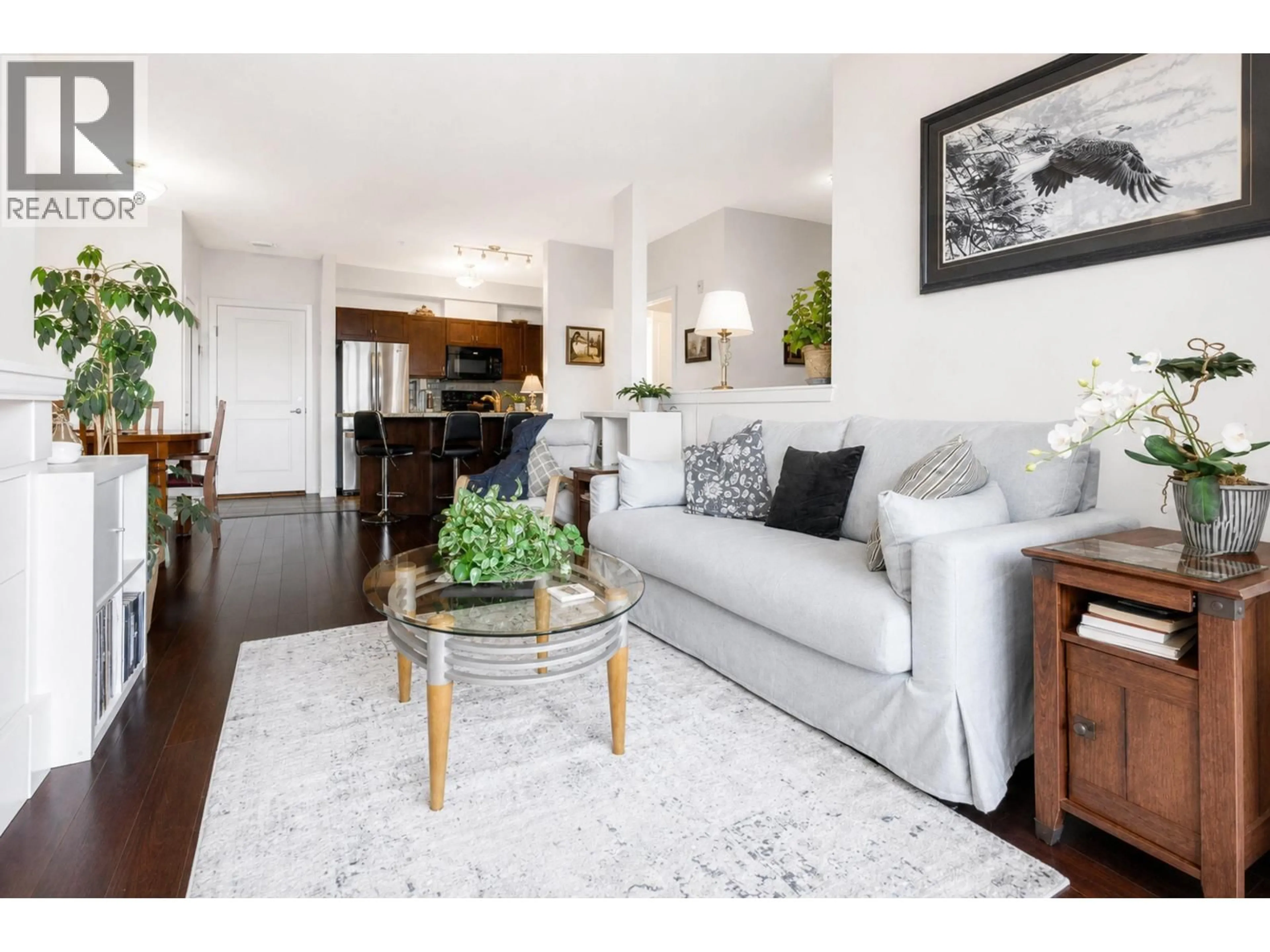 Living room with furniture, wood/laminate floor for 310 - 2336 WHYTE AVENUE, Port Coquitlam British Columbia V3C0A7