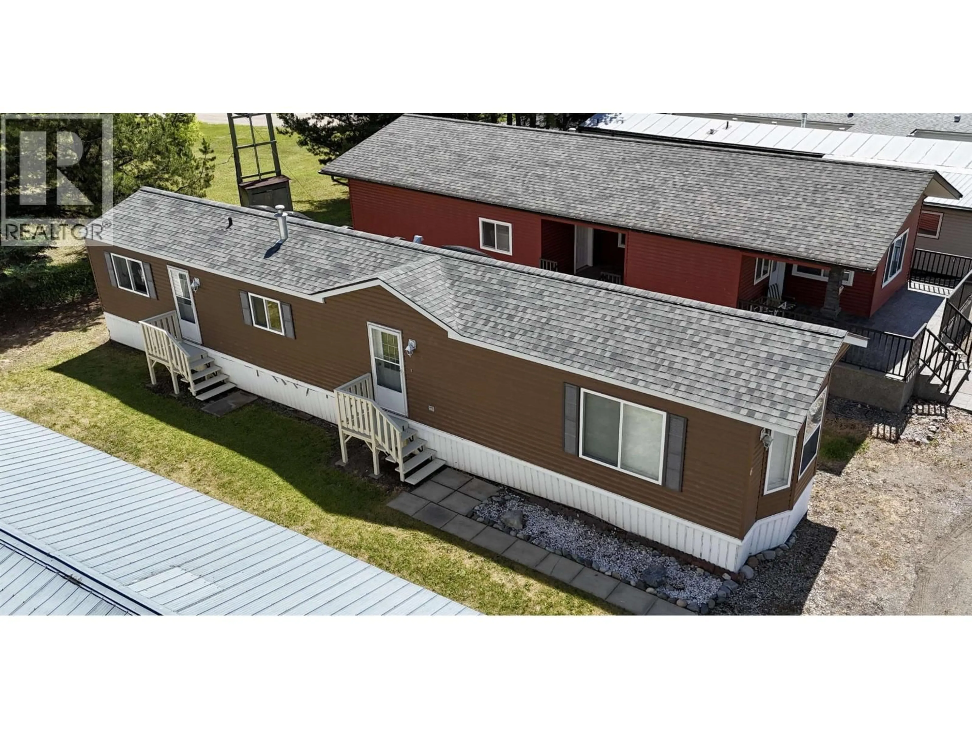 A pic from outside/outdoor area/front of a property/back of a property/a pic from drone, building for 6 - 176 NORTHSIDE ROAD, Vanderhoof British Columbia V0J3A2