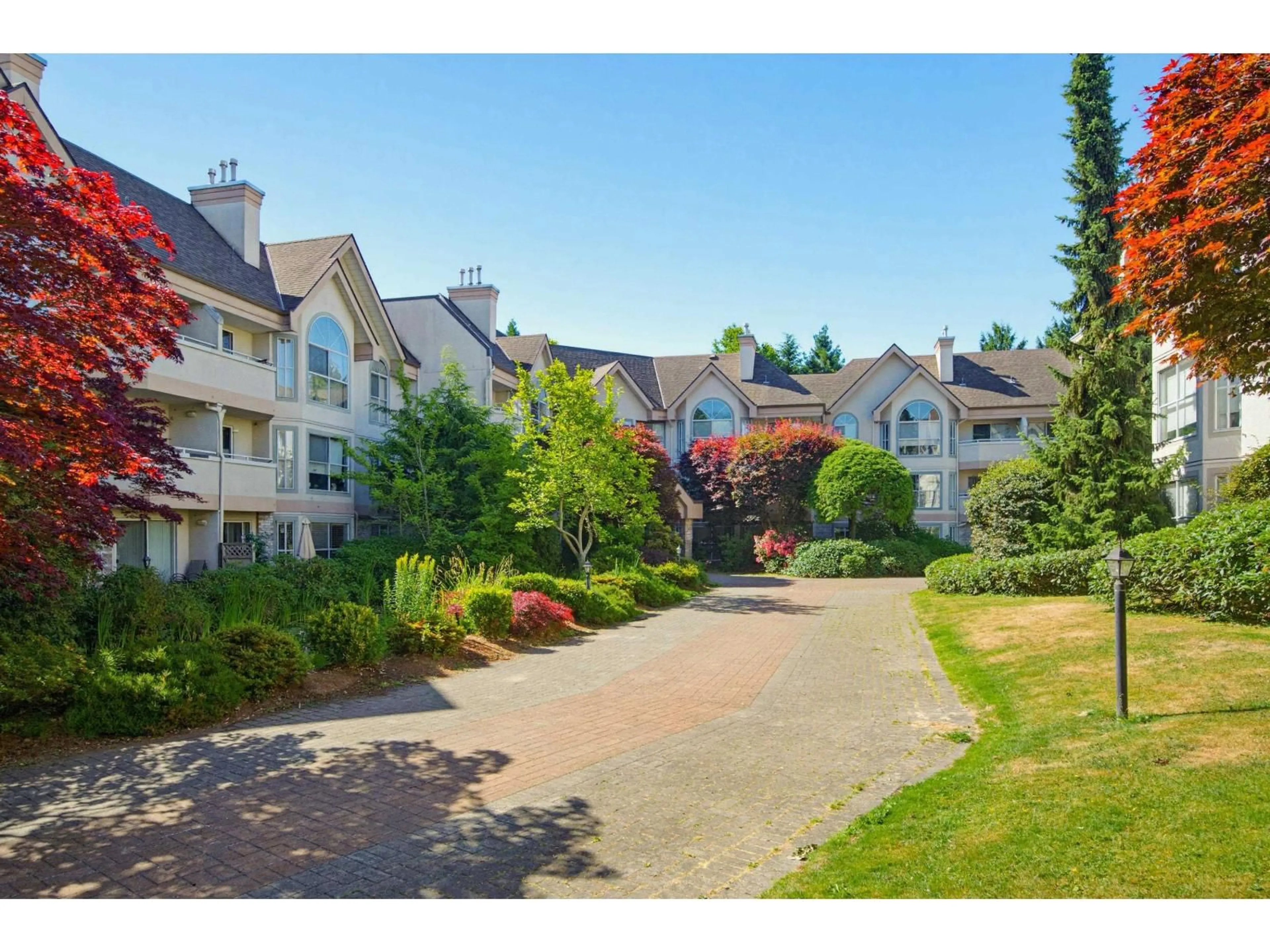 A pic from outside/outdoor area/front of a property/back of a property/a pic from drone, mountain view for 217 - 7151 121 STREET, Surrey British Columbia V3W0E7