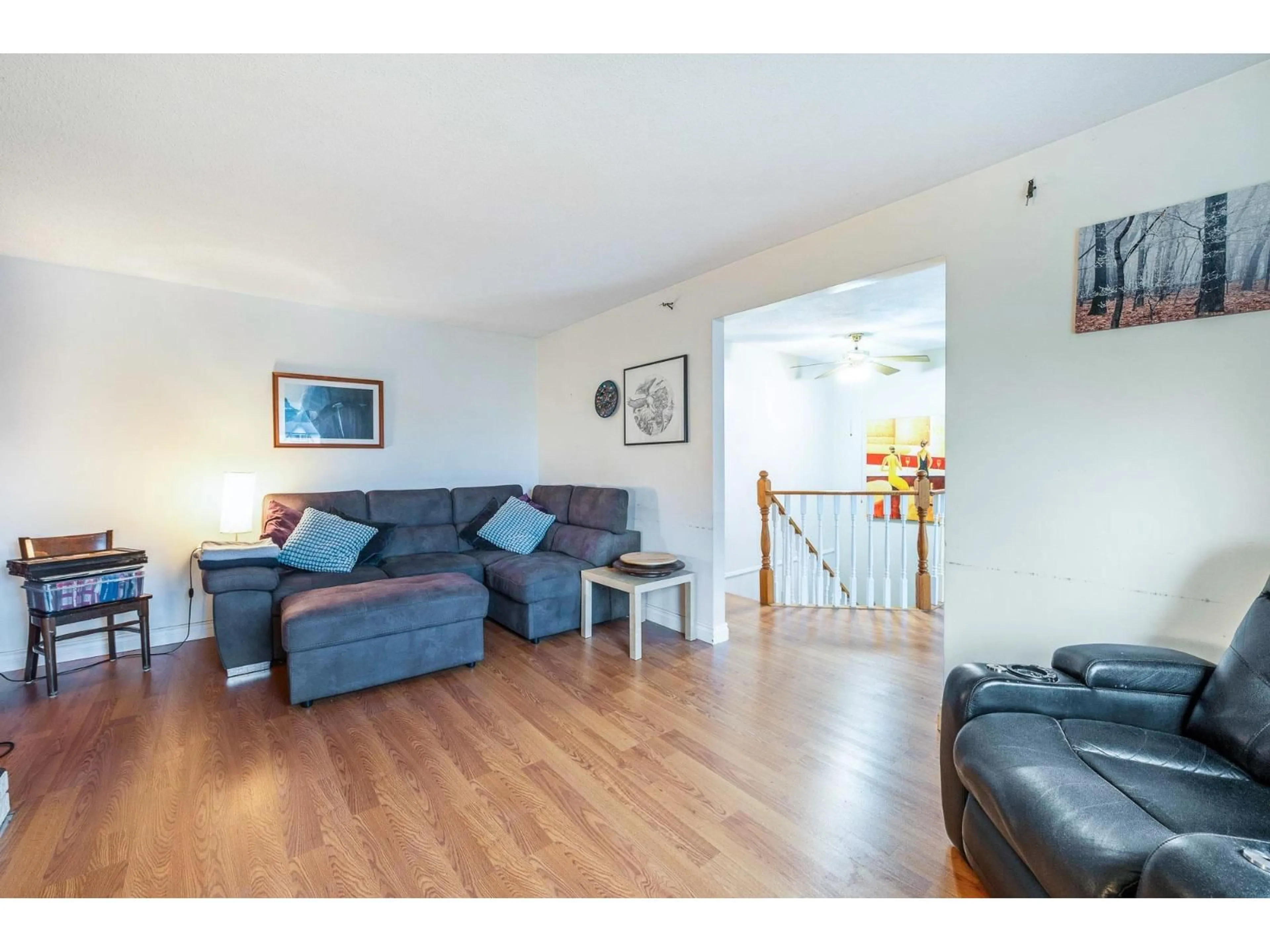 Living room with furniture, wood/laminate floor for 8625 MARGATE PLACE, Surrey British Columbia V3S5B3