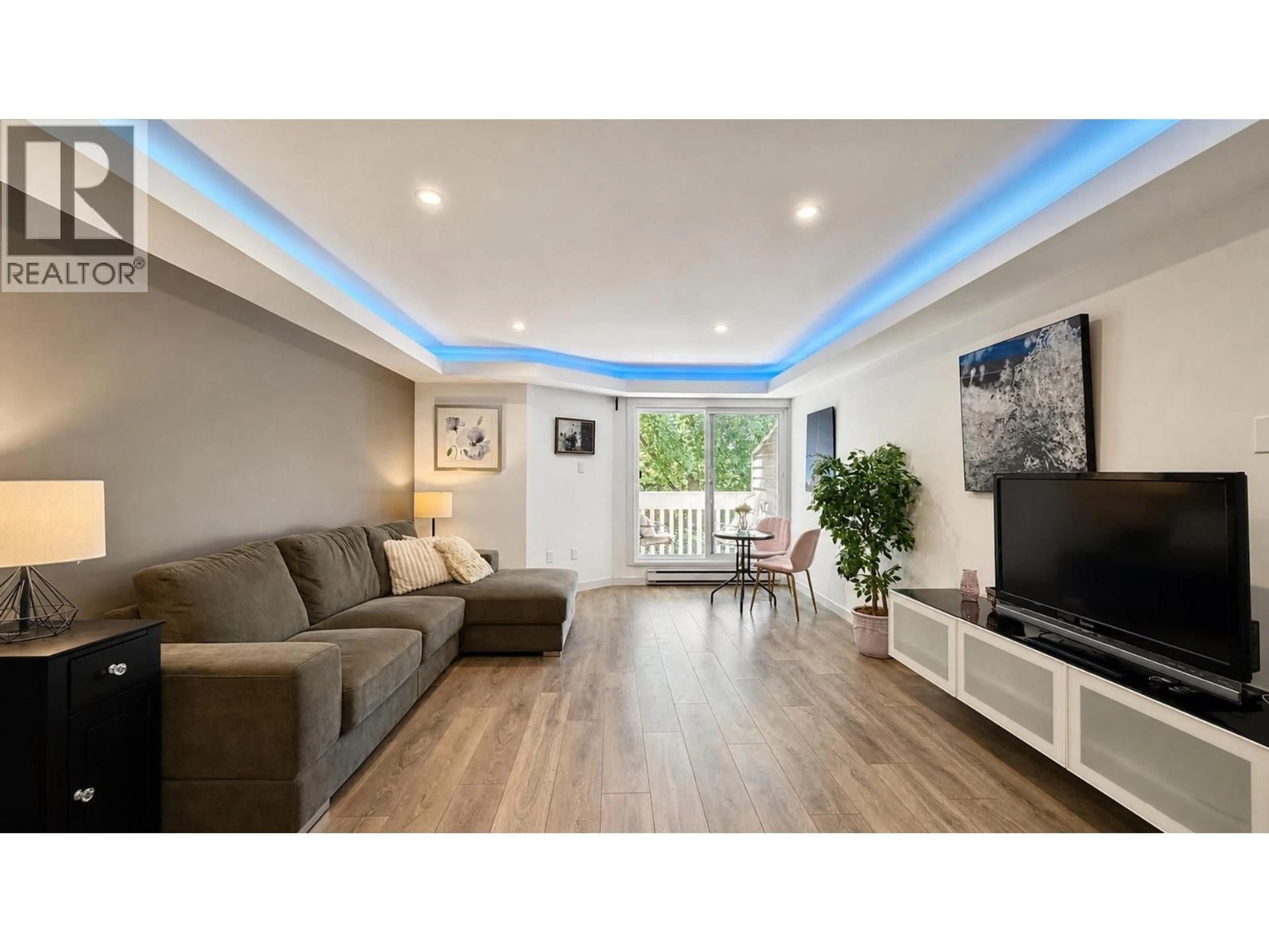 Living room with furniture, wood/laminate floor for 214 - 1545 2ND AVENUE, Vancouver British Columbia V5N1C8