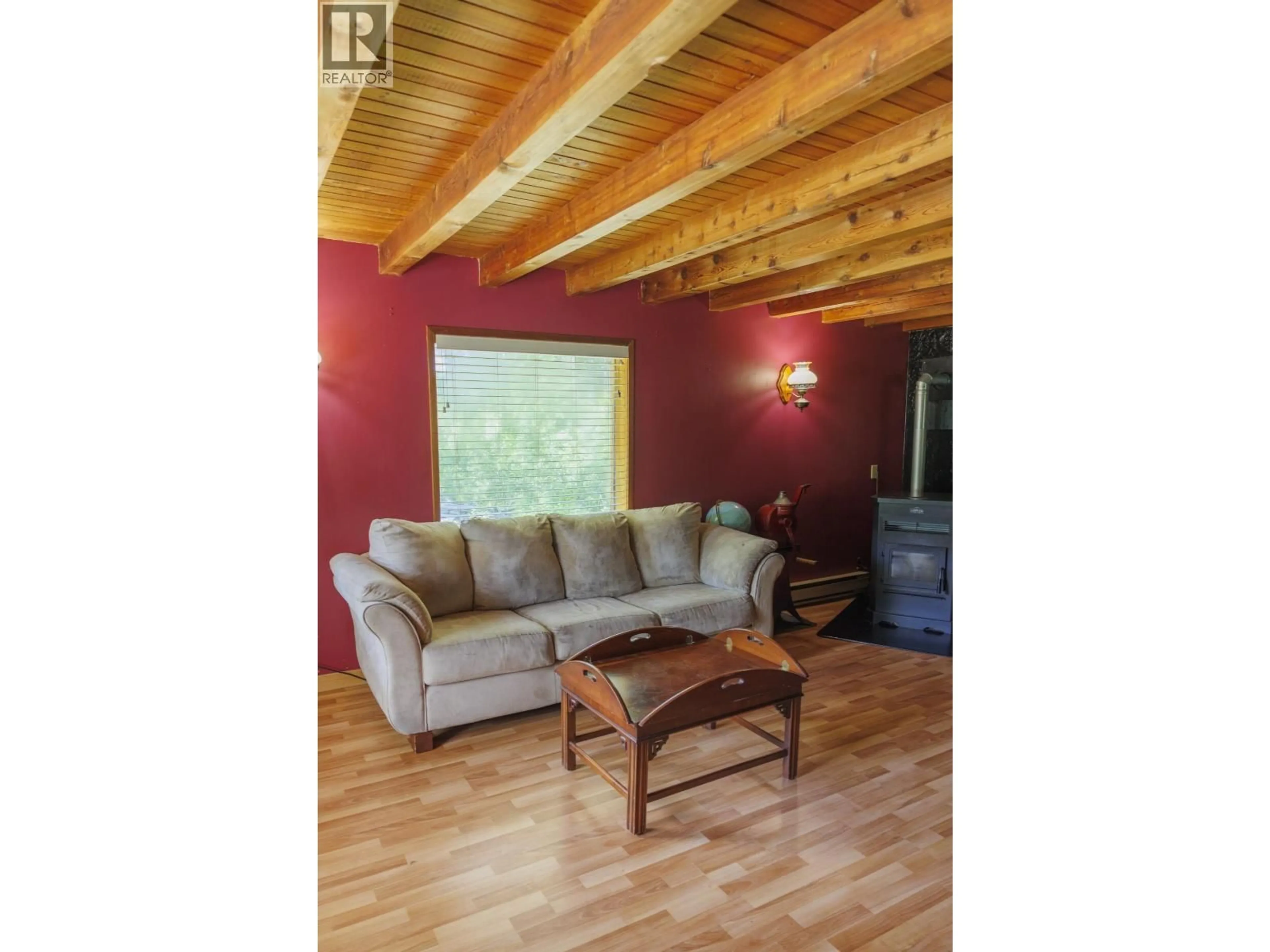 Living room with furniture, wood/laminate floor for 4600 EDDY ROAD, McBride British Columbia V0J2E0