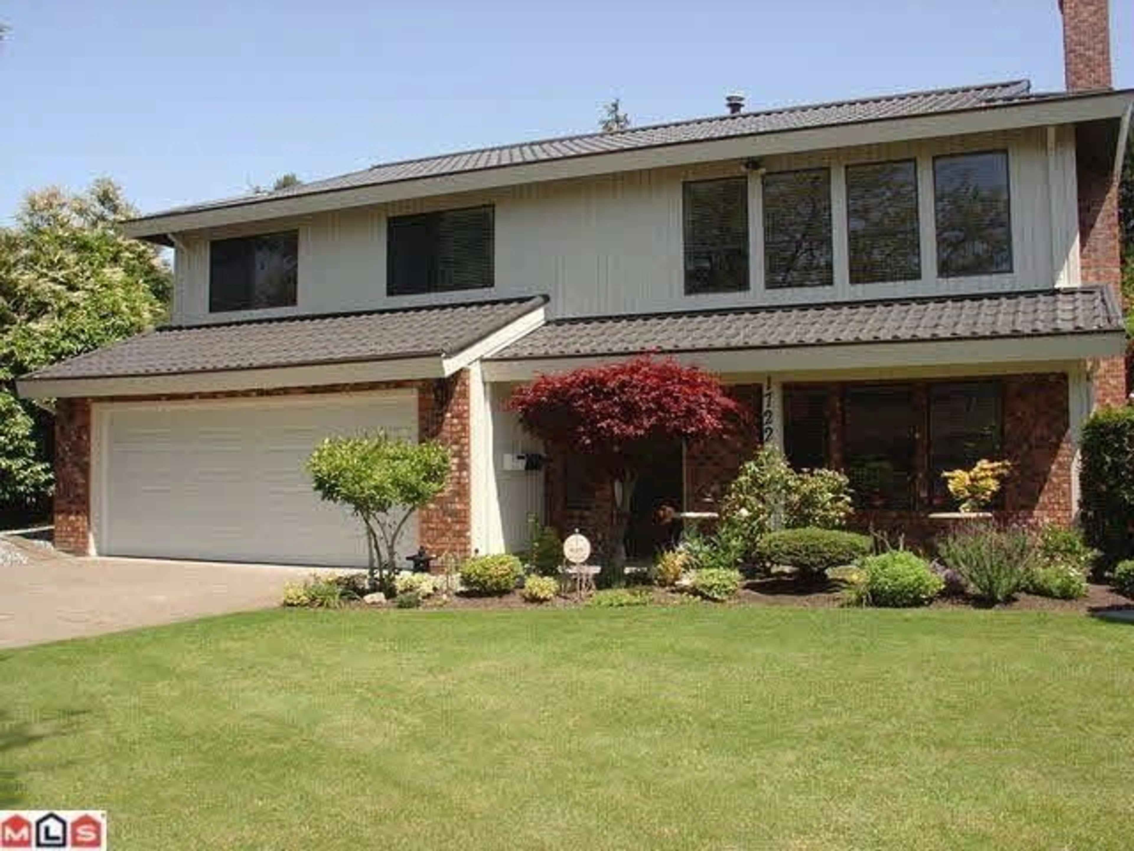 Home with vinyl exterior material, street for 1722 145A STREET, Surrey British Columbia V4A5T9