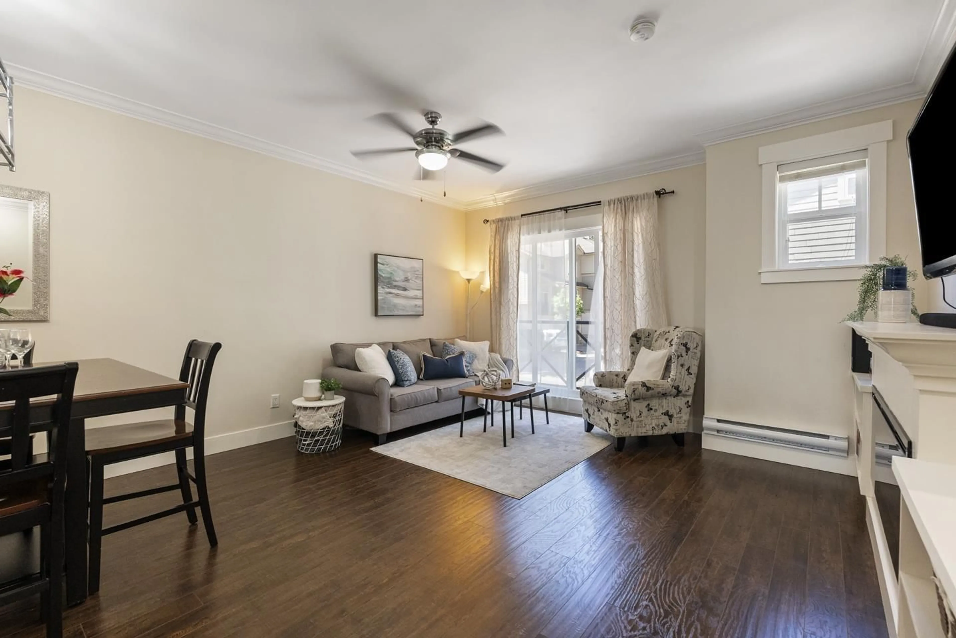 Living room with furniture, wood/laminate floor for 3 - 5957 152 STREET, Surrey British Columbia V3S3K4