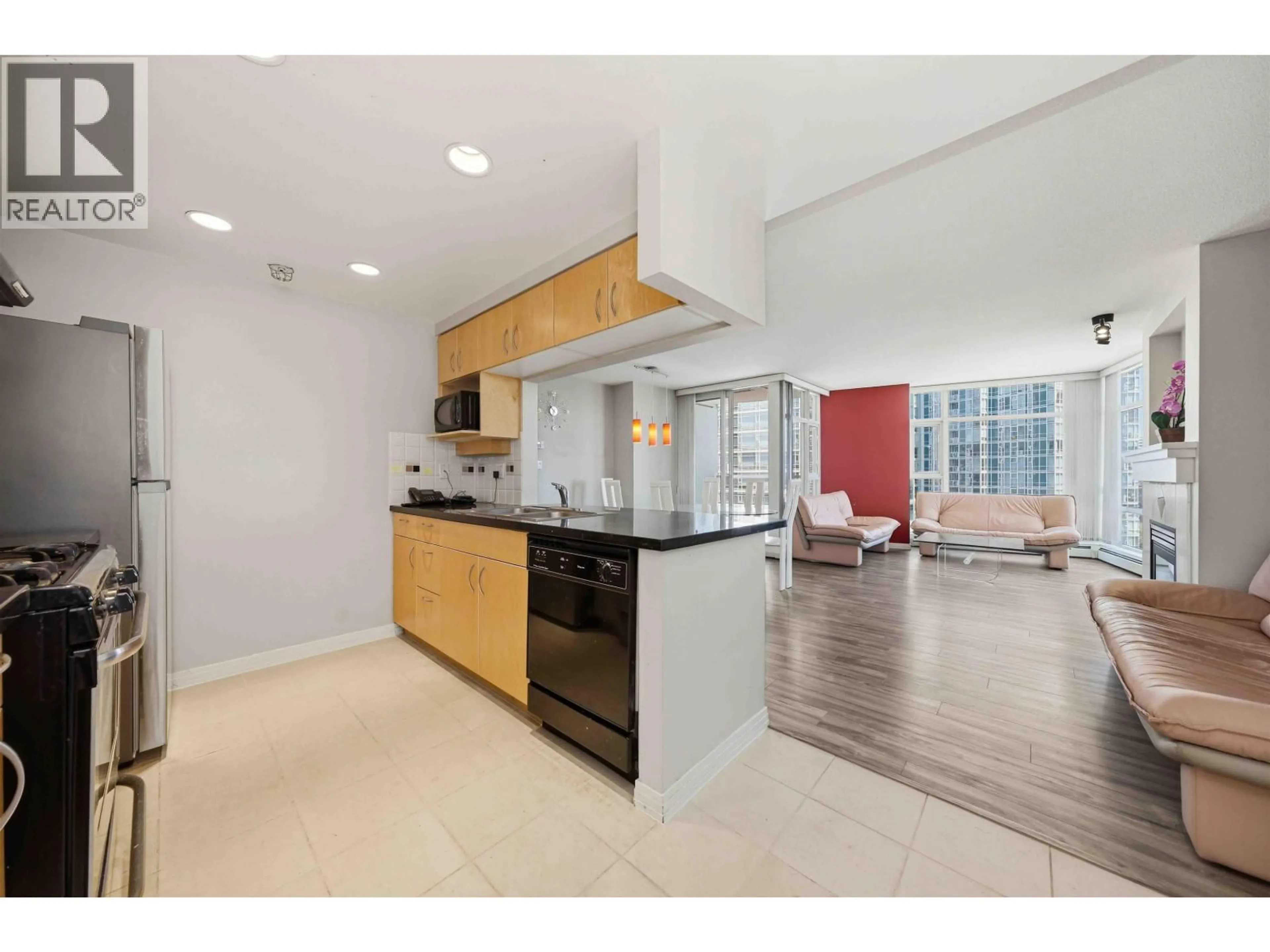 Open concept kitchen, unknown for 2303 - 1199 MARINASIDE CRESCENT, Vancouver British Columbia V6Z2Y2