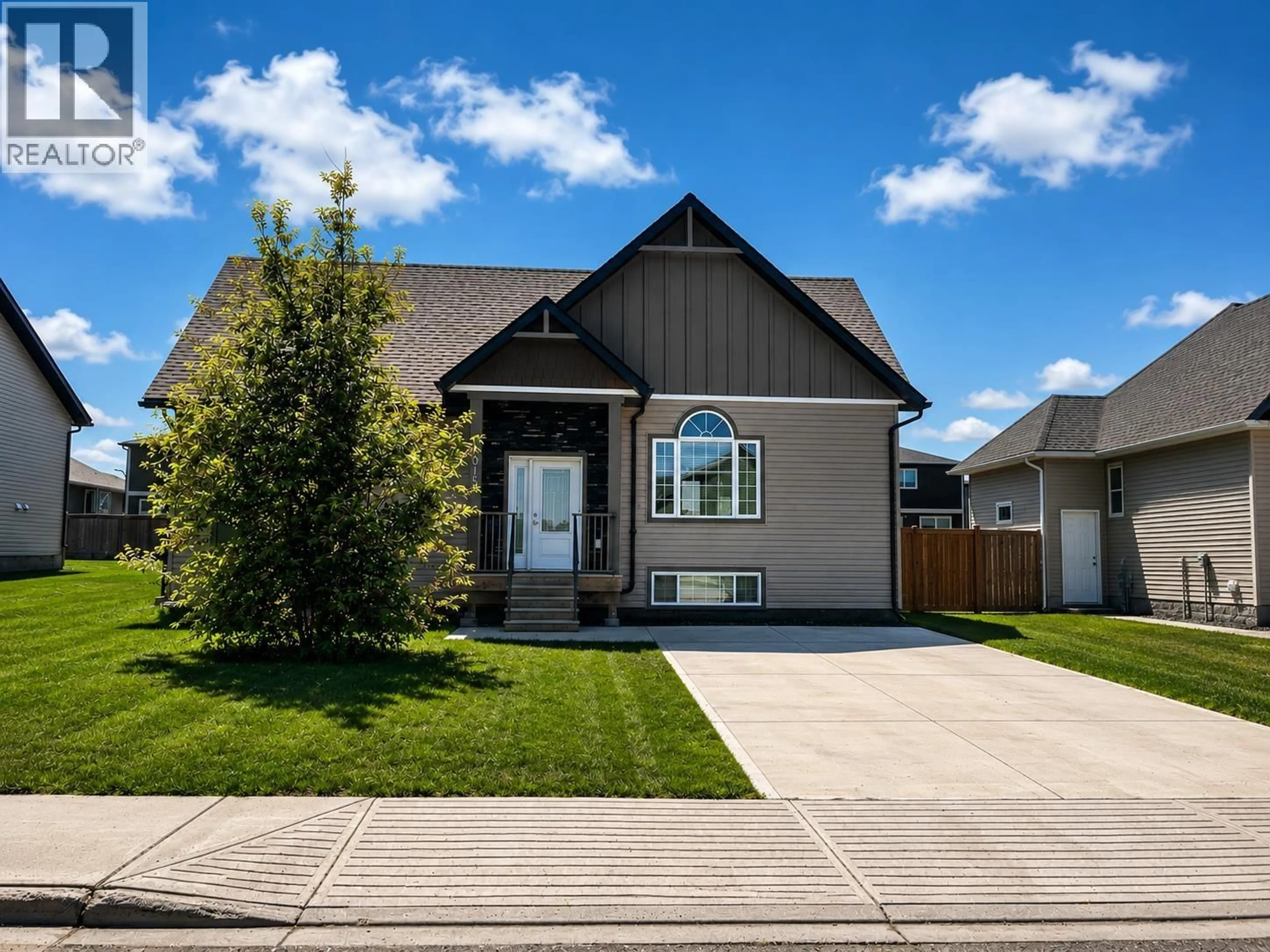 Home with vinyl exterior material, street for 11015 105 AVENUE, Fort St. John British Columbia V1J0L6