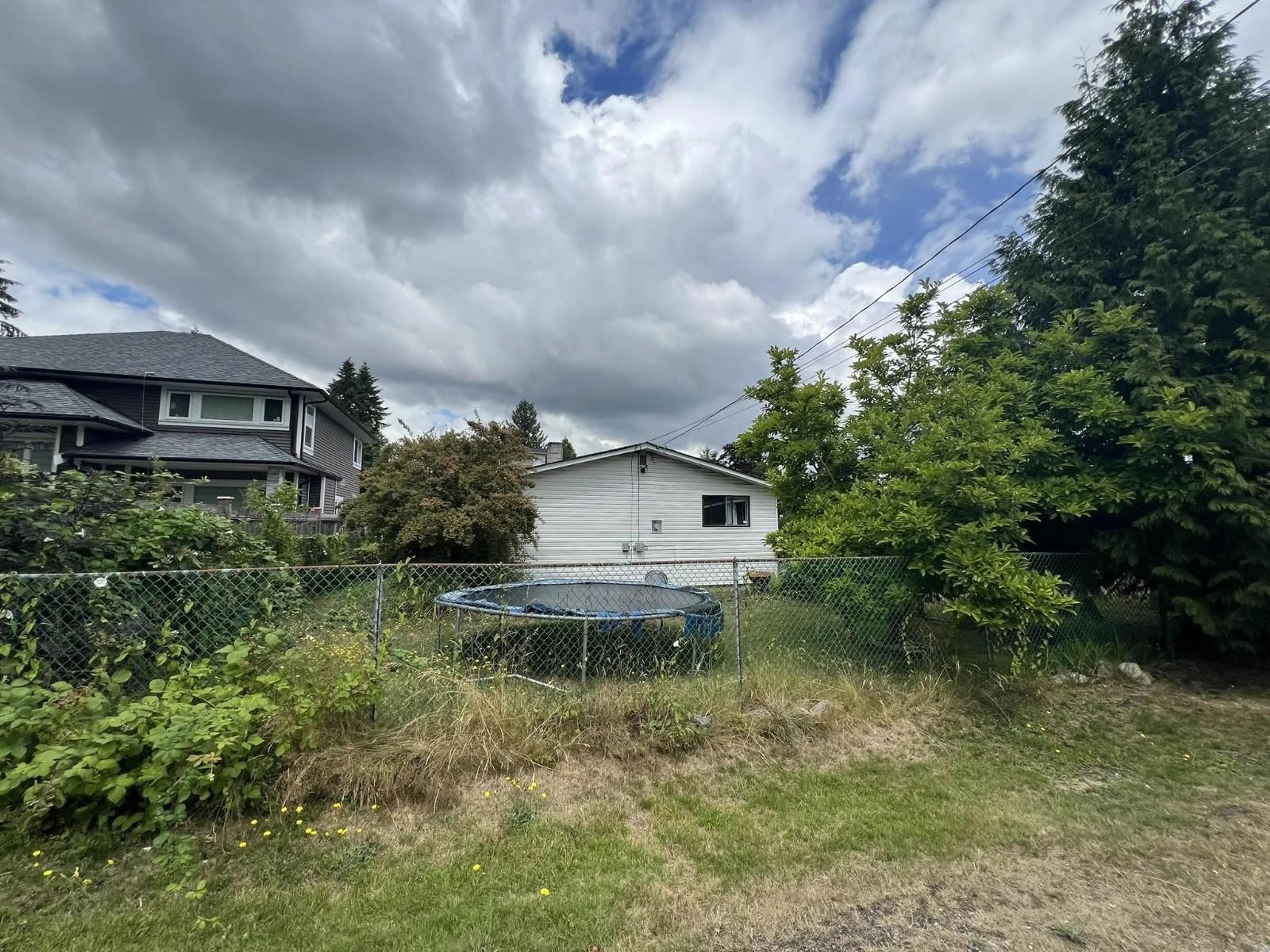 A pic from outside/outdoor area/front of a property/back of a property/a pic from drone, water/lake/river/ocean view for 10307 146 STREET, Surrey British Columbia V3R3T3