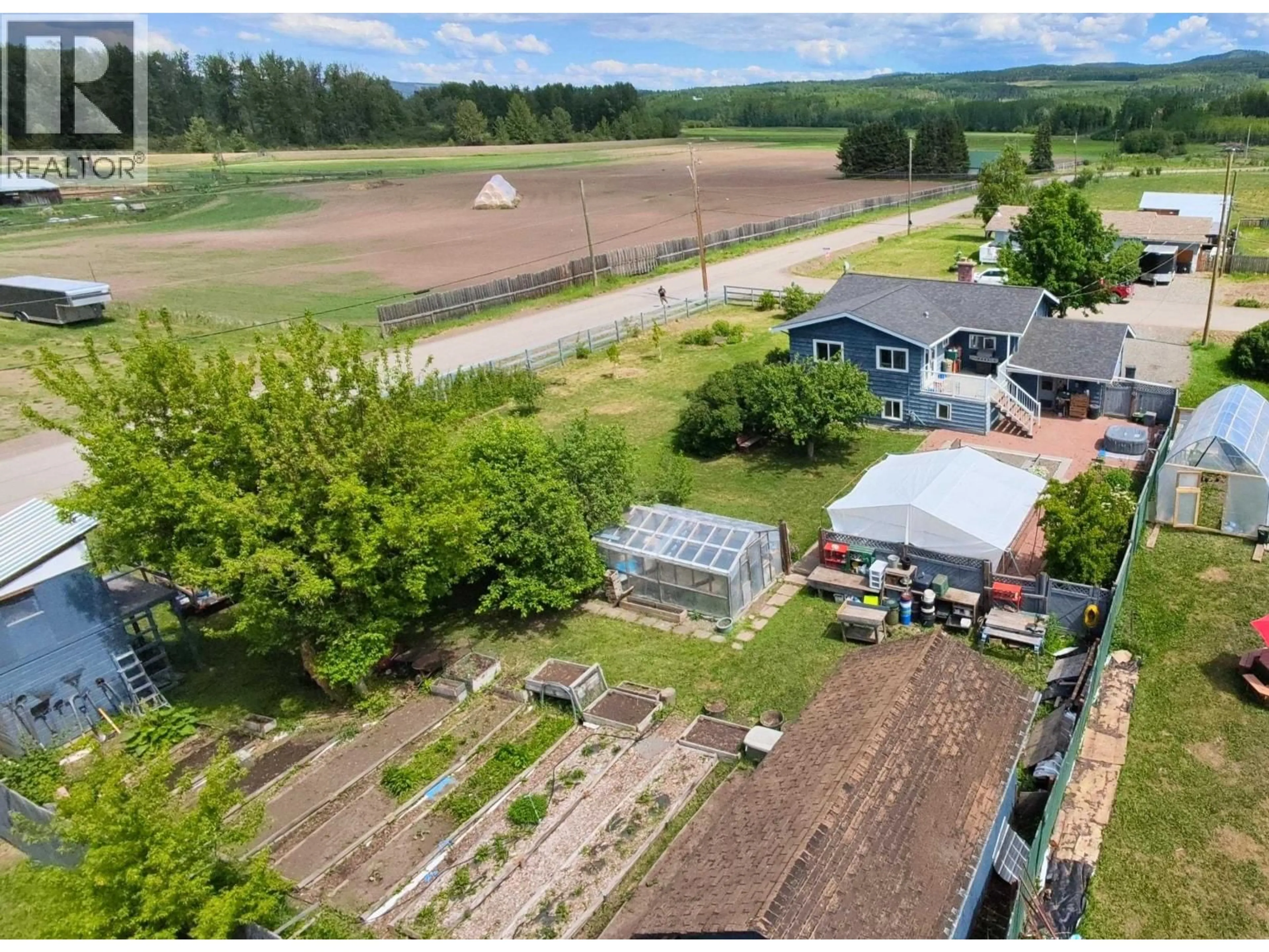 A pic from outside/outdoor area/front of a property/back of a property/a pic from drone, mountain view for 2585 DOMINION AVENUE, Houston British Columbia V0J1Z2