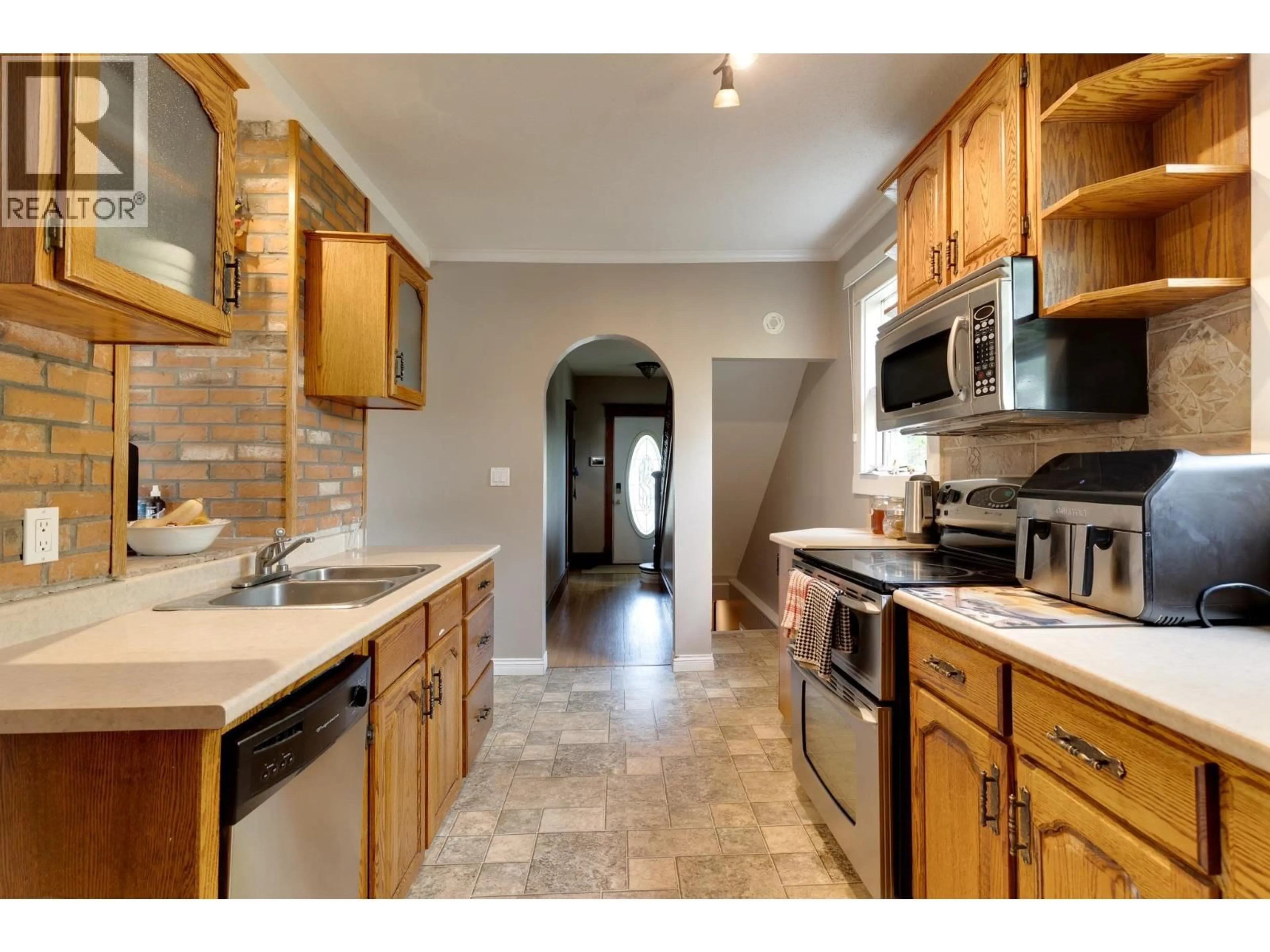 Open concept kitchen, ceramic/tile floor for 1488 GORSE STREET, Prince George British Columbia V2L1G3