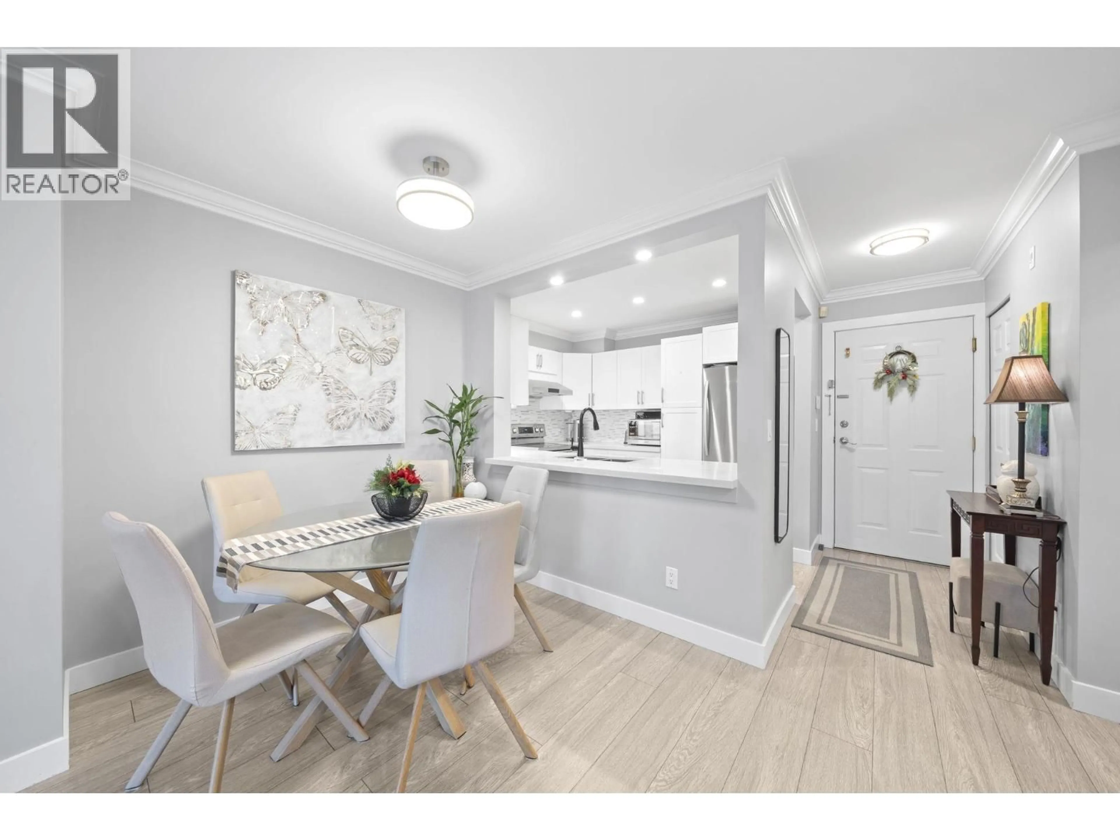 Open concept kitchen, wood/laminate floor for 326 - 5500 ANDREWS ROAD, Richmond British Columbia V7E6M9