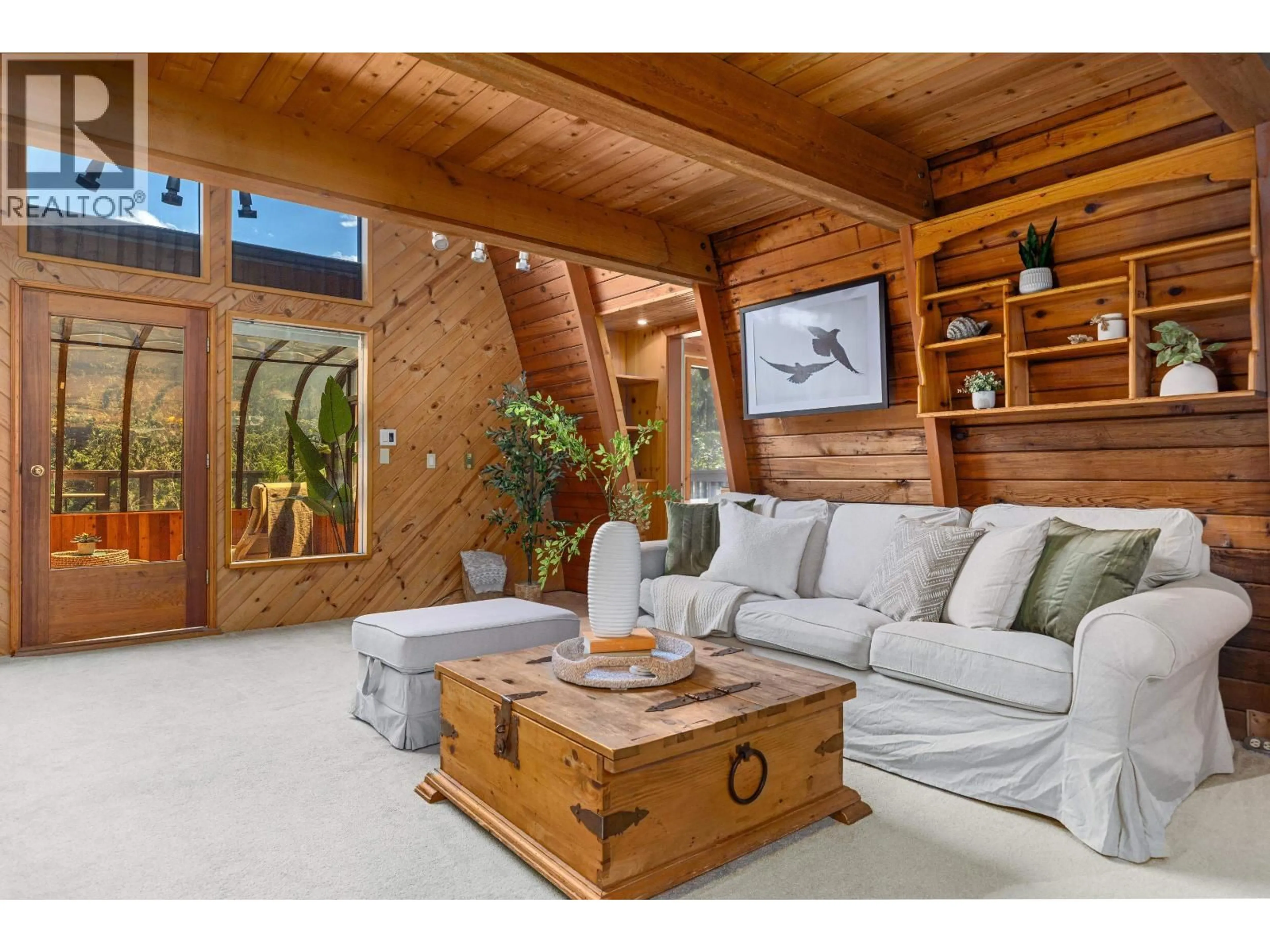Living room with furniture, wood/laminate floor for 9480 EMERALD DRIVE, Whistler British Columbia V8E0G5
