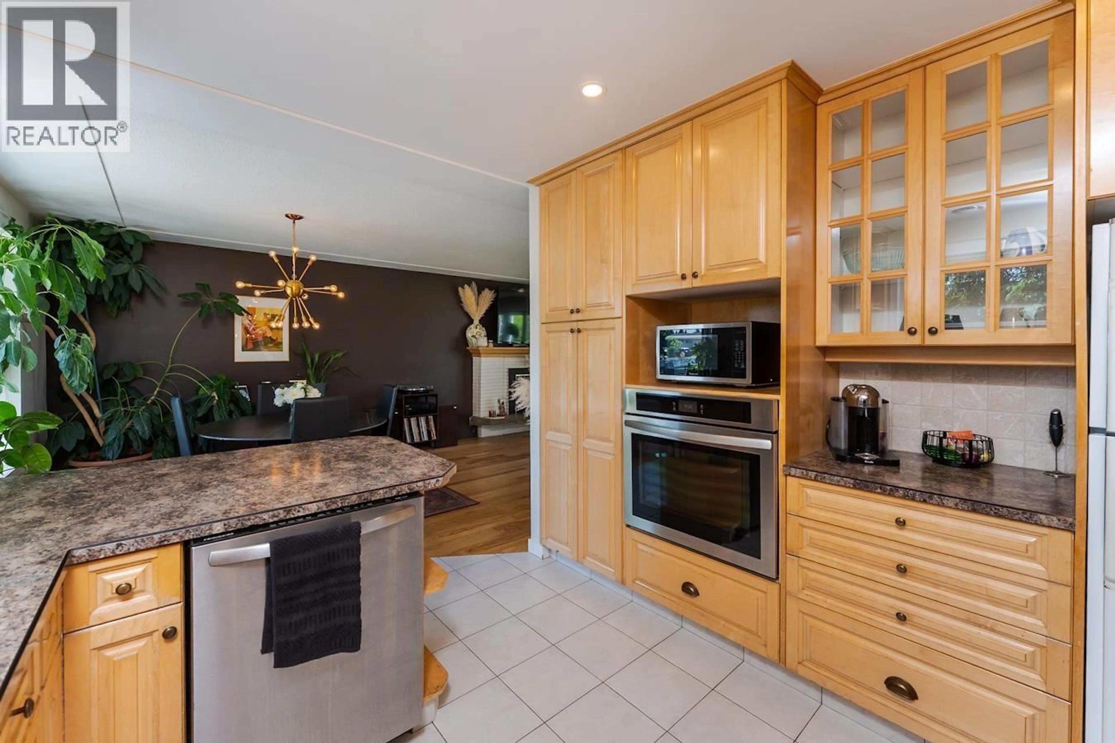 Open concept kitchen, ceramic/tile floor for 208 RILEY DRIVE, Prince George British Columbia V2M3P1