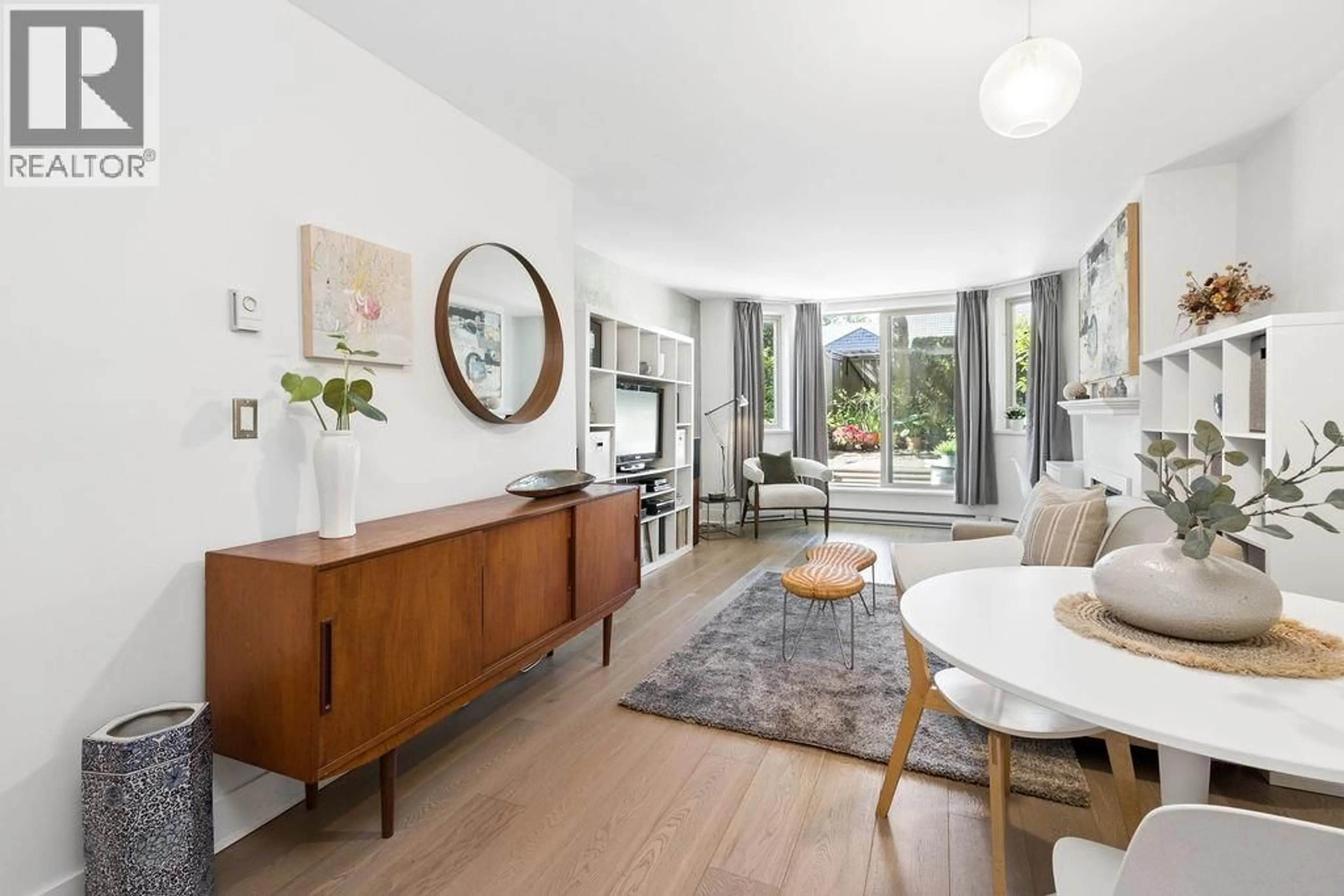 Living room with furniture, wood/laminate floor for 1B - 2775 FIR STREET, Vancouver British Columbia V6J3C2