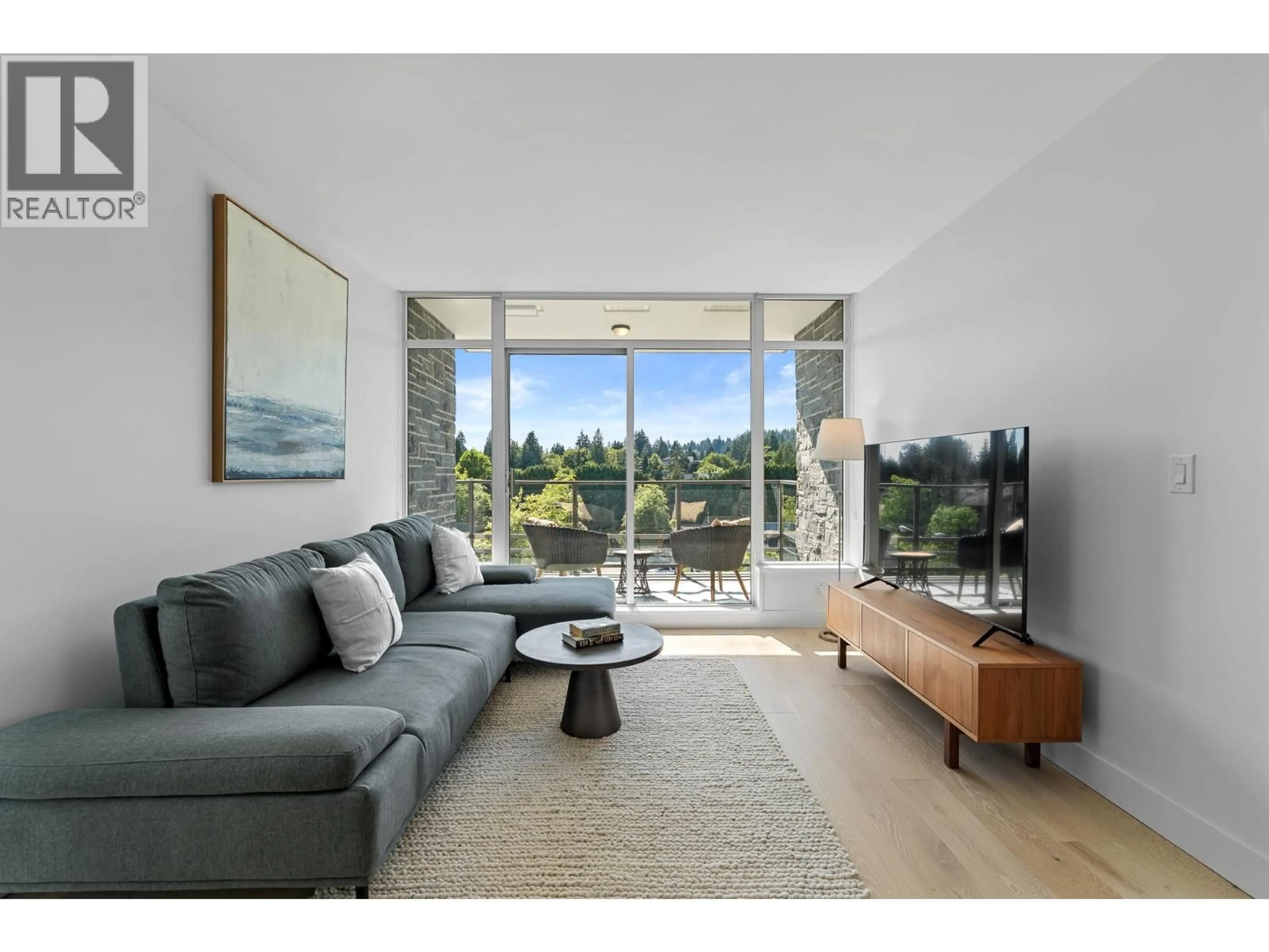 Living room with furniture, unknown for 404 - 1210 27TH STREET, North Vancouver British Columbia V7J0C5