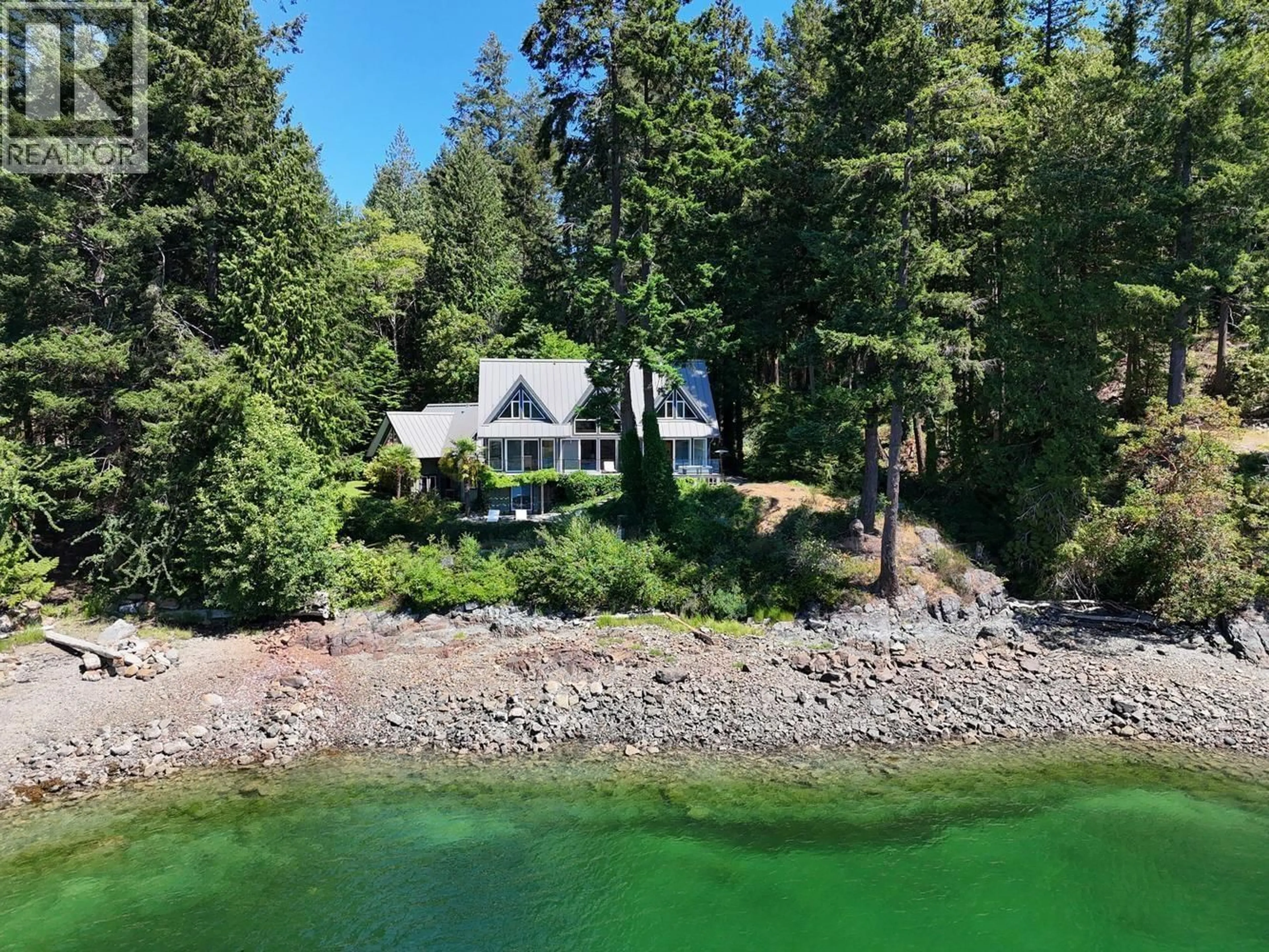 A pic from outside/outdoor area/front of a property/back of a property/a pic from drone, water/lake/river/ocean view for 4990 FRANCIS PENINSULA ROAD, Pender Harbour British Columbia V0N2H1
