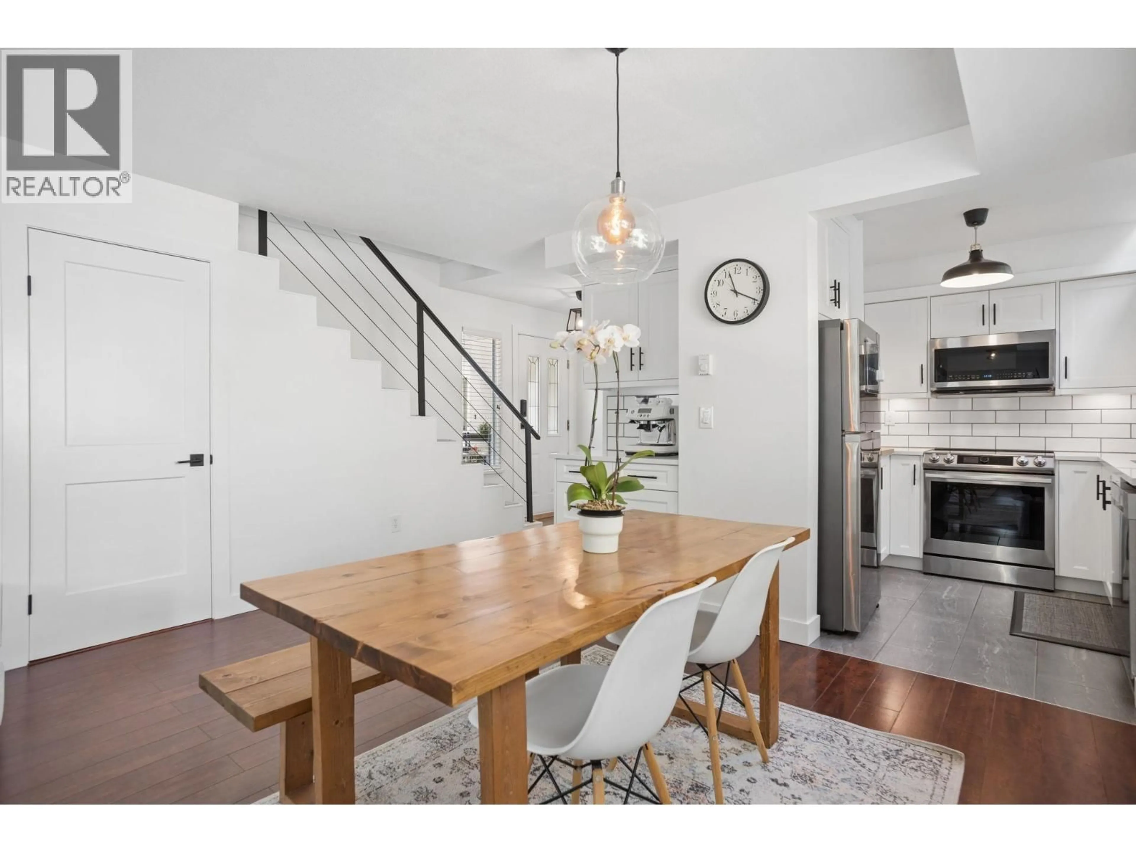 Open concept kitchen, wood/laminate floor for 5630 16TH AVENUE, Delta British Columbia V4L1G7