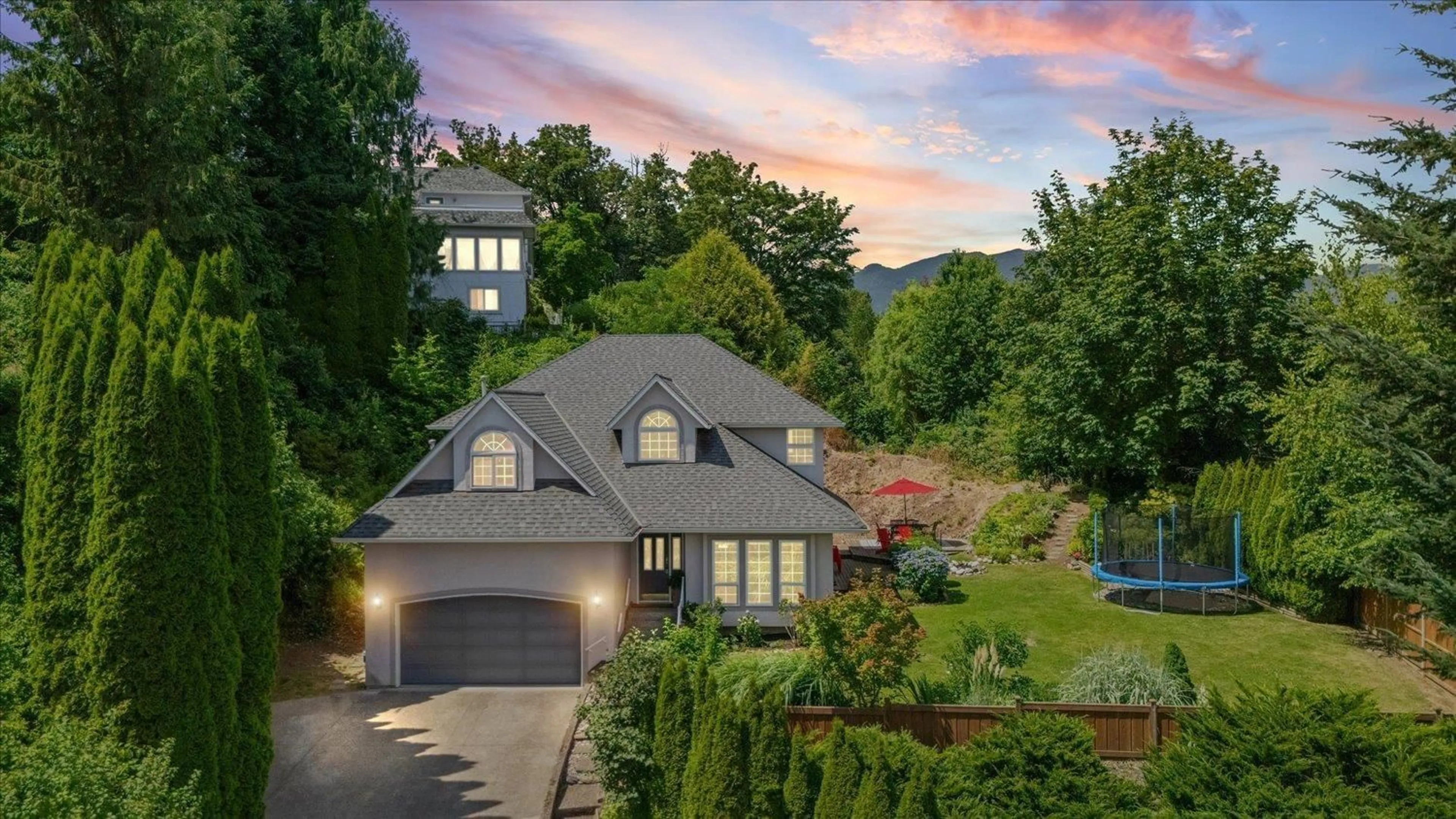 A pic from outside/outdoor area/front of a property/back of a property/a pic from drone, mountain view for 8767 FREELAND PLACE, Chilliwack British Columbia V2R3J1