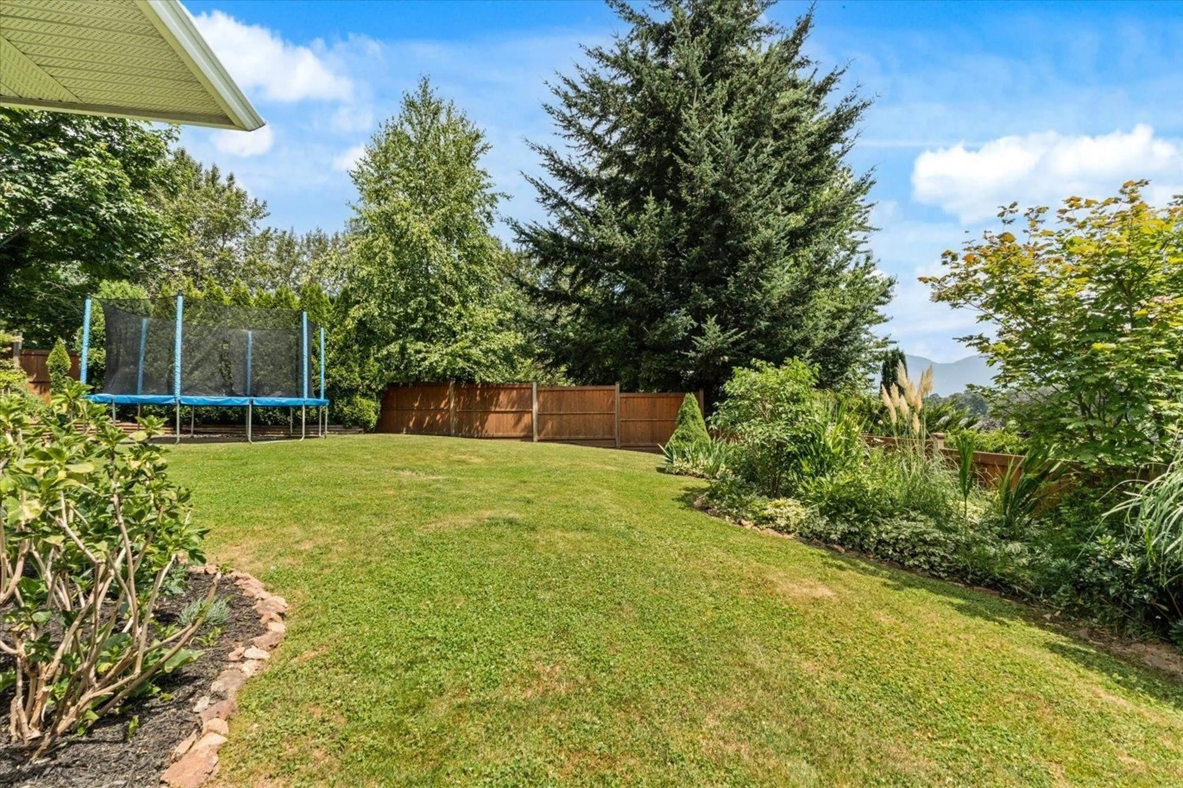 A pic from outside/outdoor area/front of a property/back of a property/a pic from drone, mountain view for 8767 FREELAND PLACE, Chilliwack British Columbia V2R3J1
