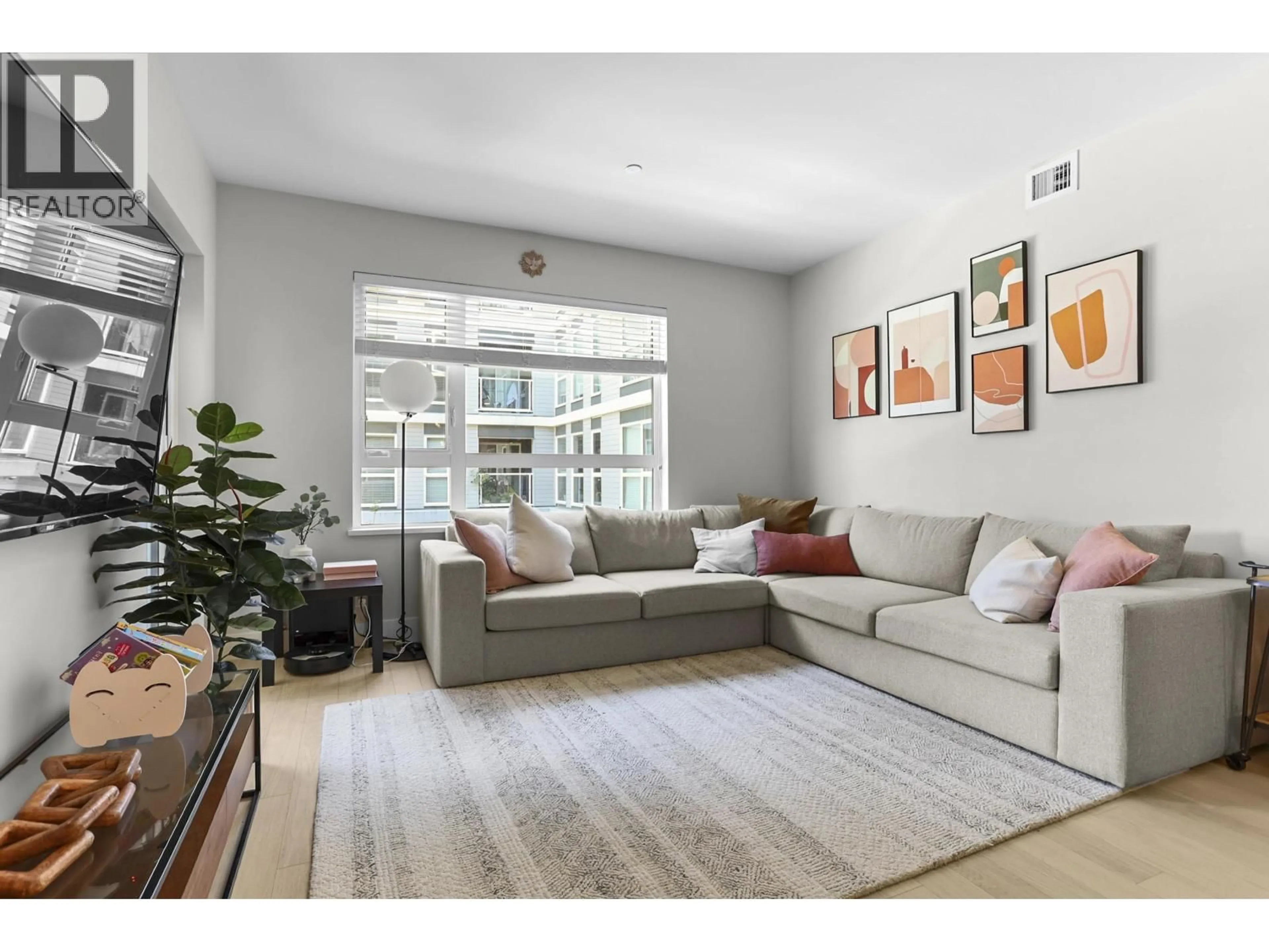 Living room with furniture, unknown for 208 - 22265 DEWDNEY TRUNK ROAD, Maple Ridge British Columbia V2X3K1