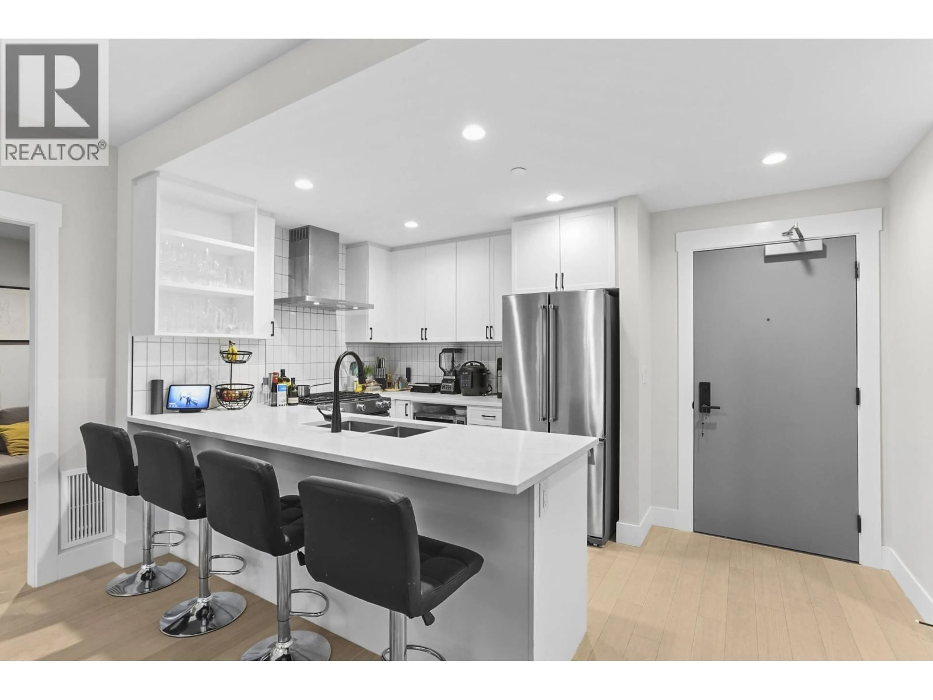 Open concept kitchen, unknown for 208 - 22265 DEWDNEY TRUNK ROAD, Maple Ridge British Columbia V2X3K1