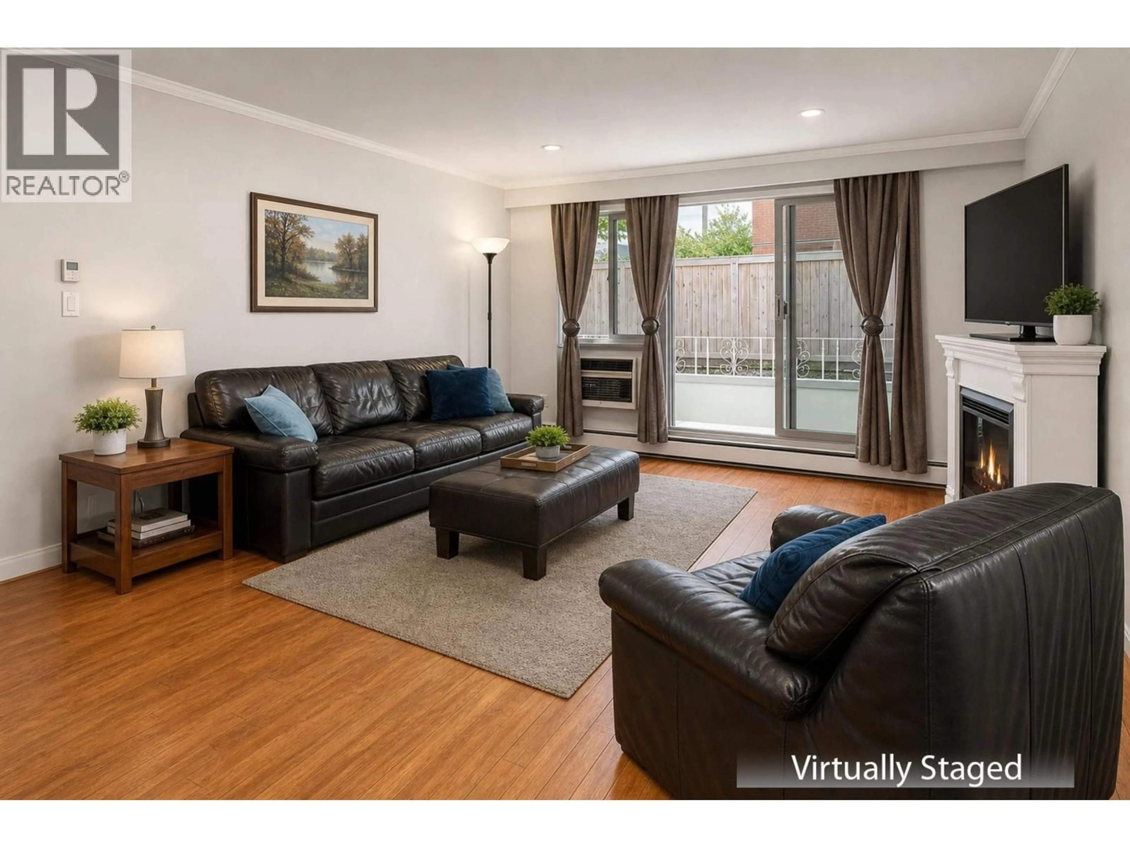 Living room with furniture, wood/laminate floor for 105 - 12096 222 STREET, Maple Ridge British Columbia V2X5W1
