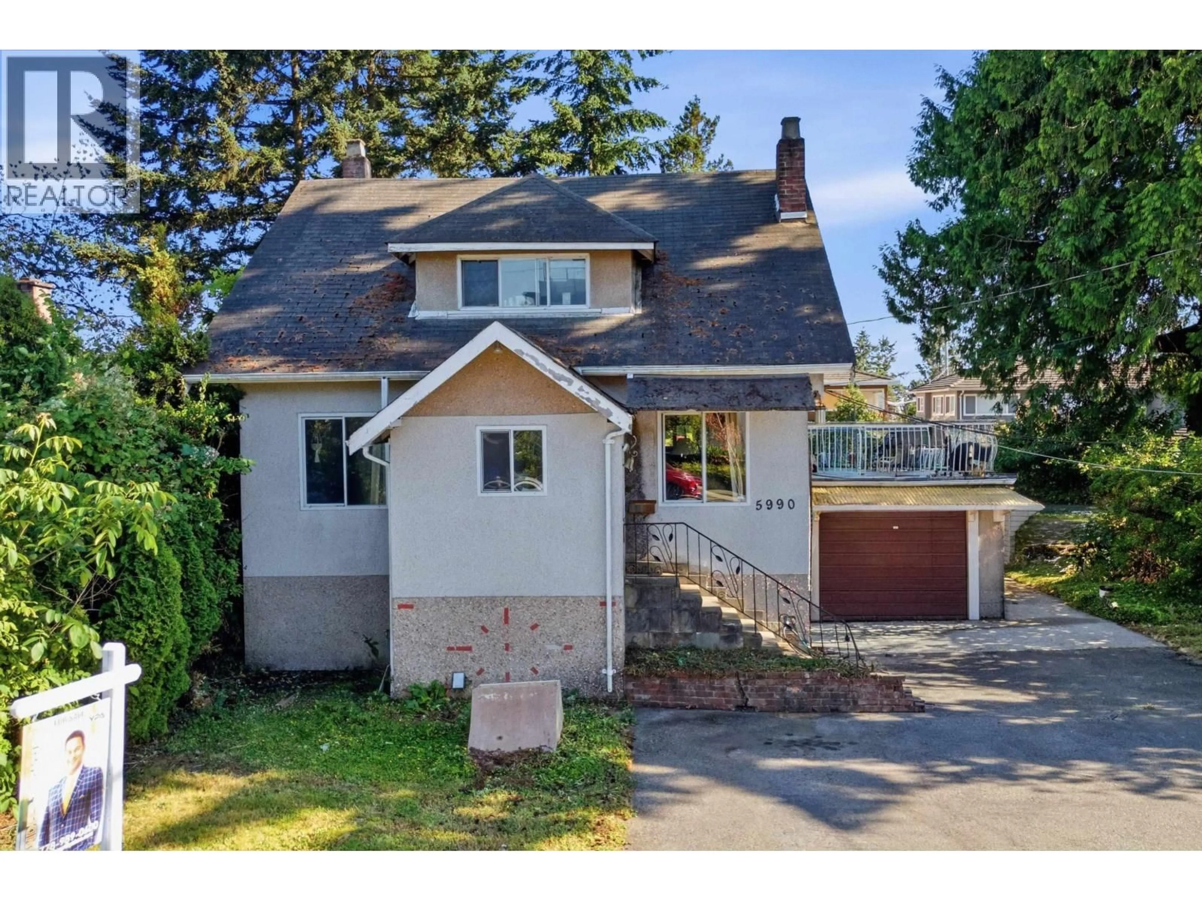 Home with vinyl exterior material, street for 5990 IRMIN STREET, Burnaby British Columbia V5J1Z1
