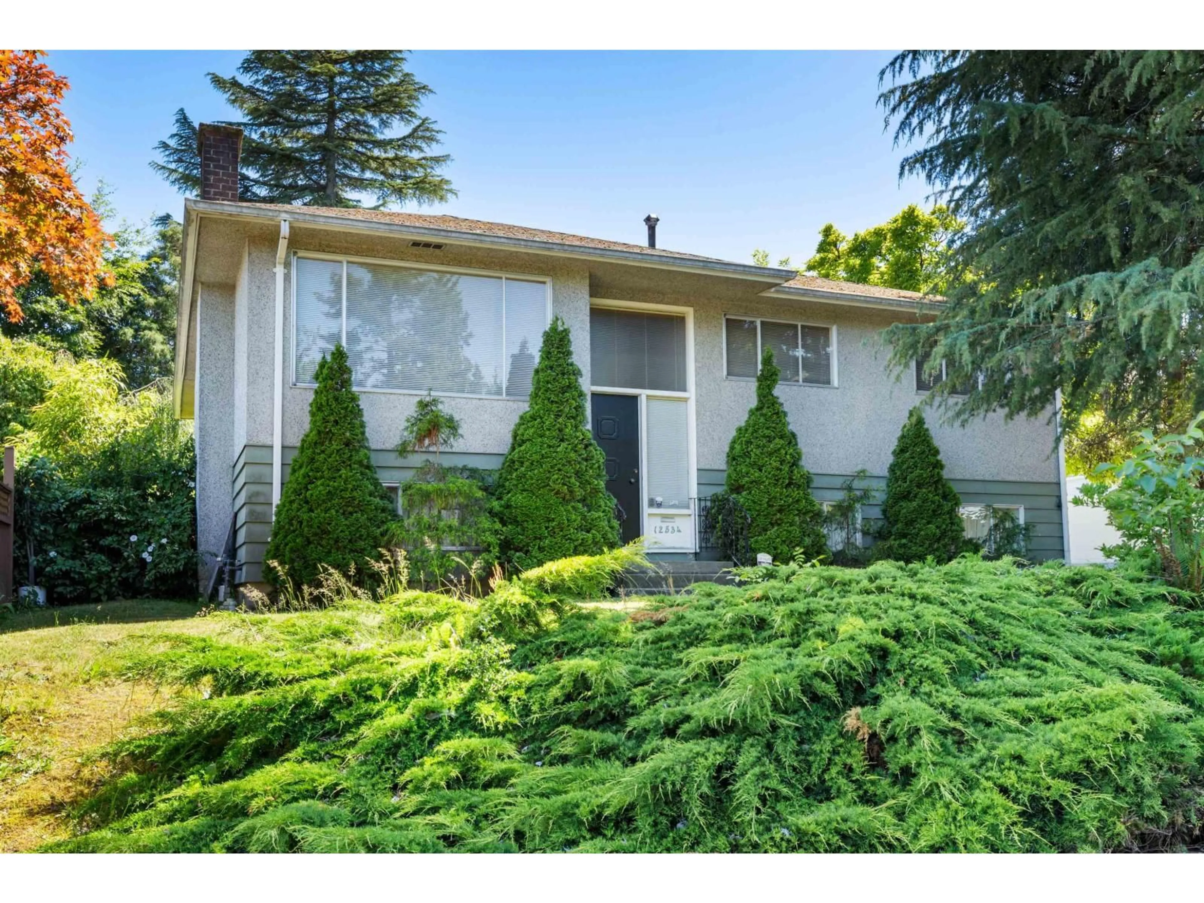Home with vinyl exterior material, street for 12534 GROVE CRESCENT, Surrey British Columbia V3V2L7