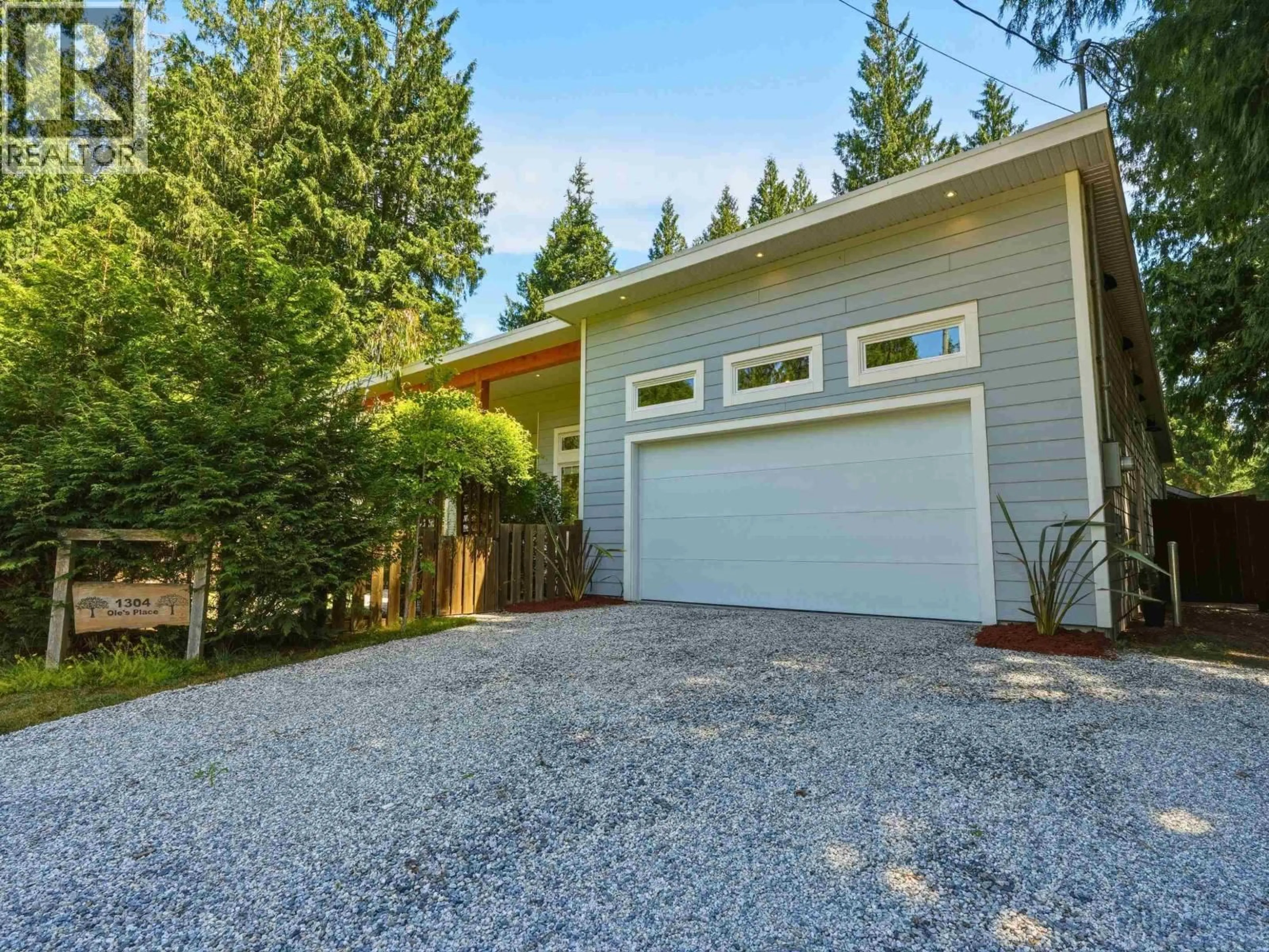 Home with vinyl exterior material, street for 1304 OLES PLACE, Roberts Creek British Columbia V0N2W2