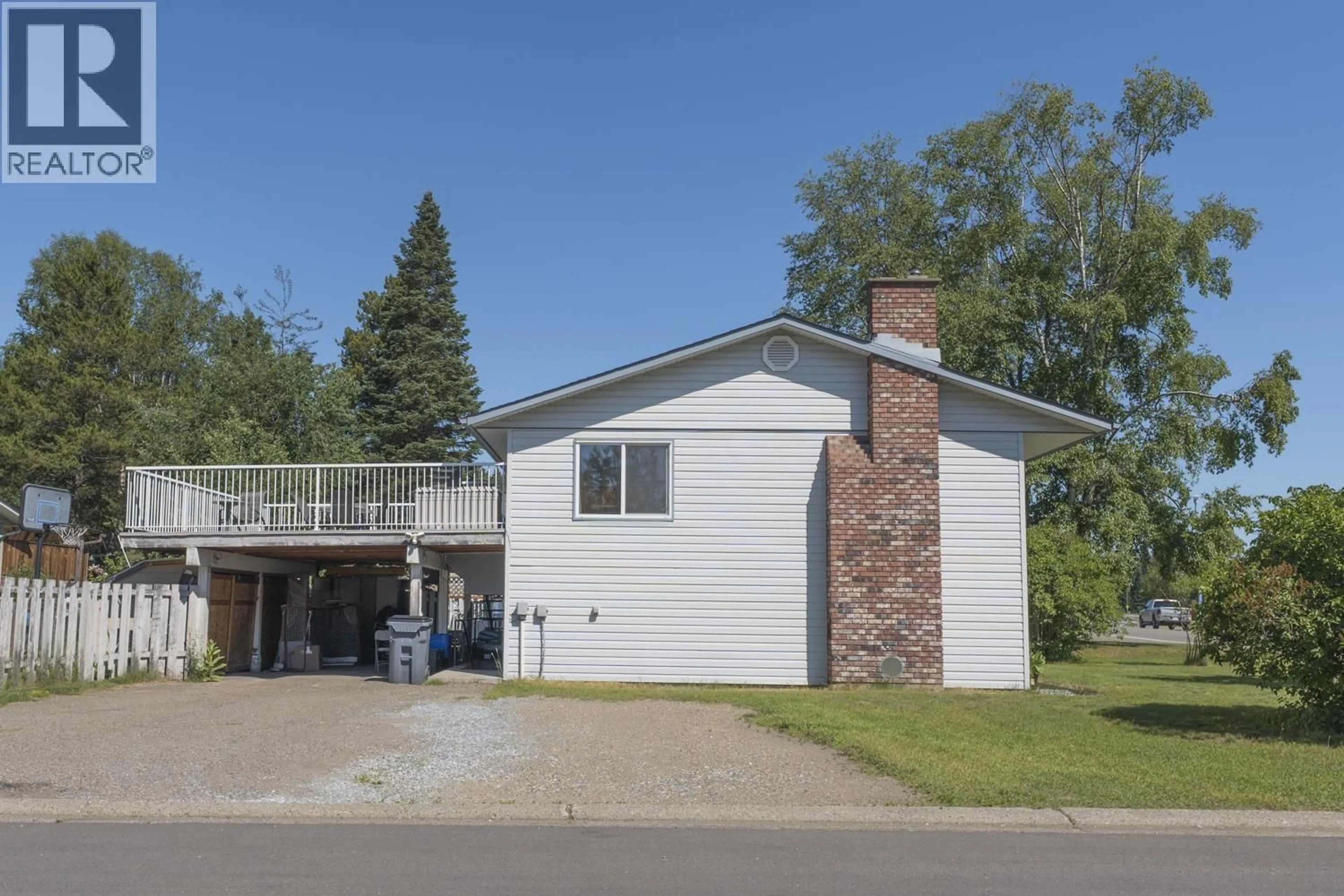 Home with vinyl exterior material, street for 5997 SIMON FRASER AVENUE, Prince George British Columbia V2N2C7