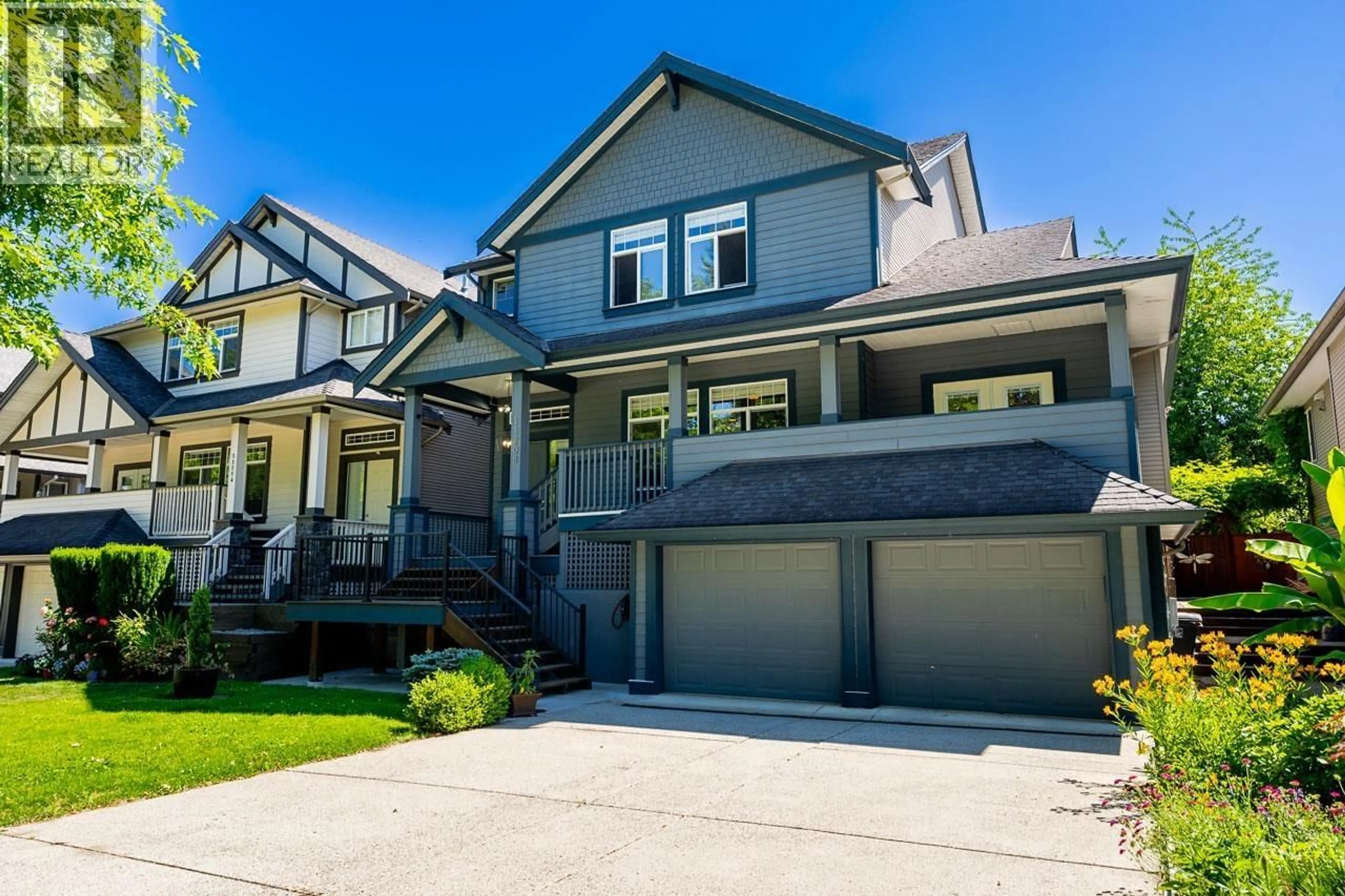Home with vinyl exterior material, street for 11208 BONSON ROAD, Pitt Meadows British Columbia V3Y2V3