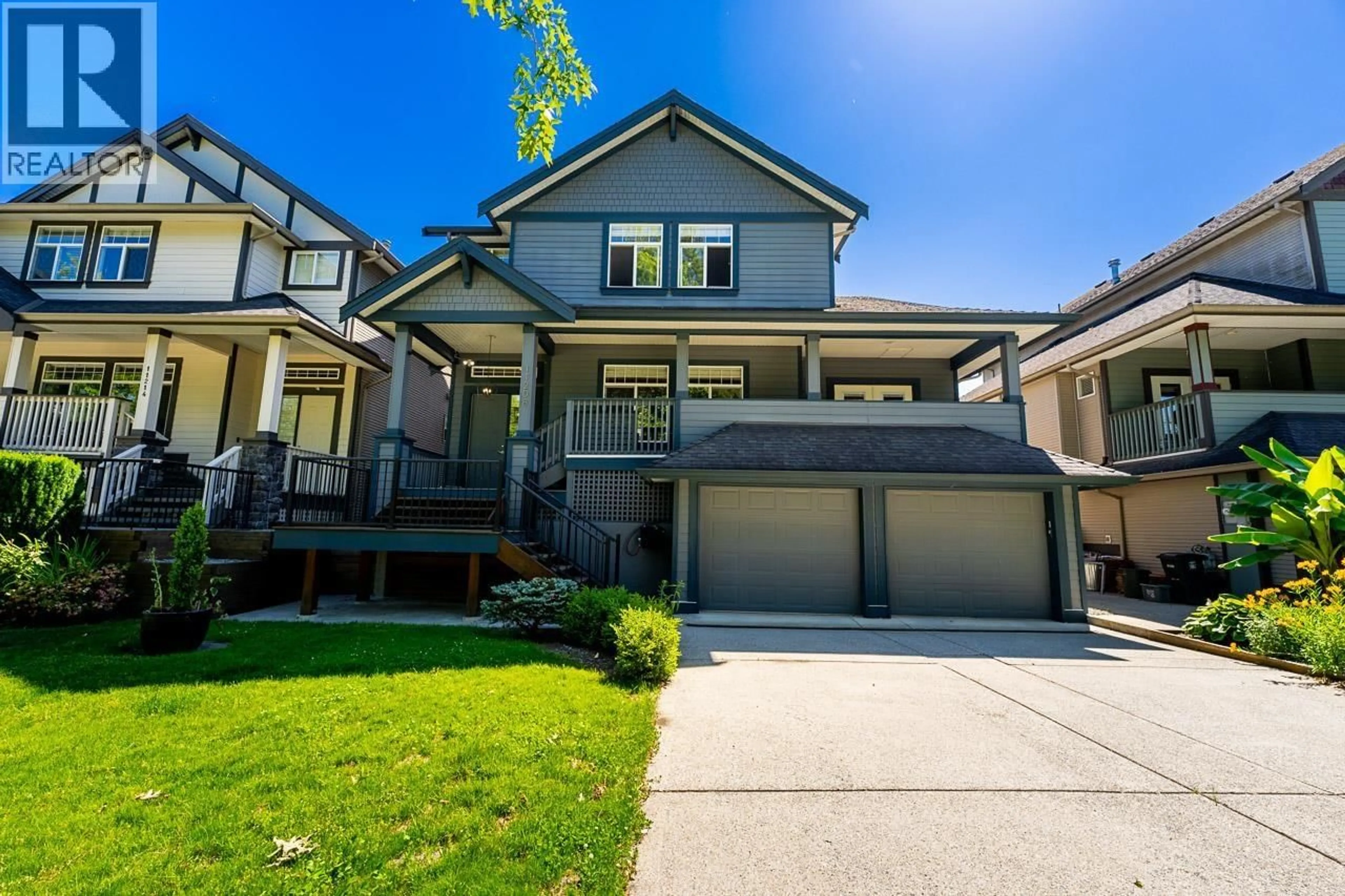 Home with vinyl exterior material, street for 11208 BONSON ROAD, Pitt Meadows British Columbia V3Y2V3