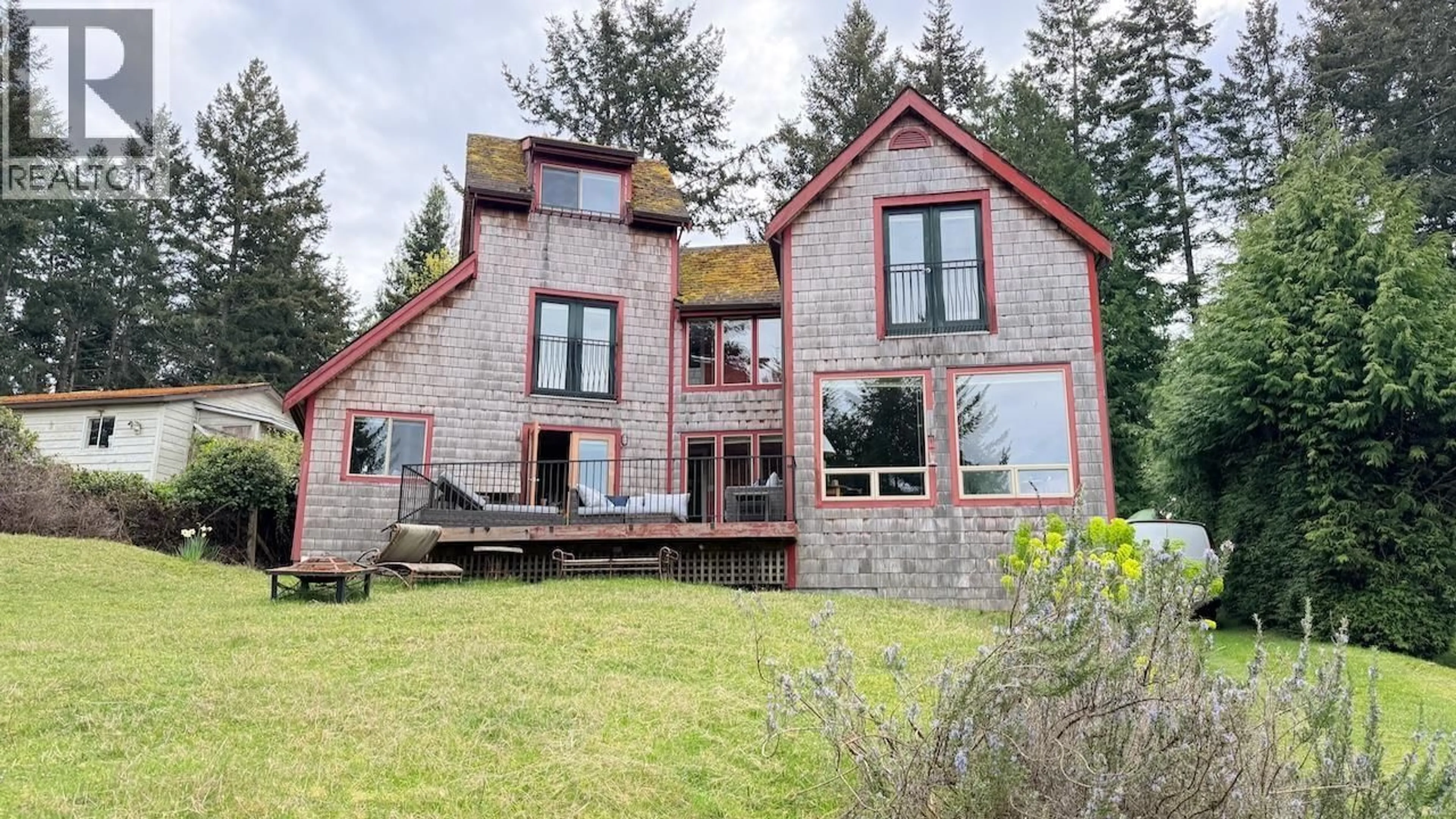 A pic from outside/outdoor area/front of a property/back of a property/a pic from drone, building for 234 MARINERS WAY, Mayne Island British Columbia V0N2J2