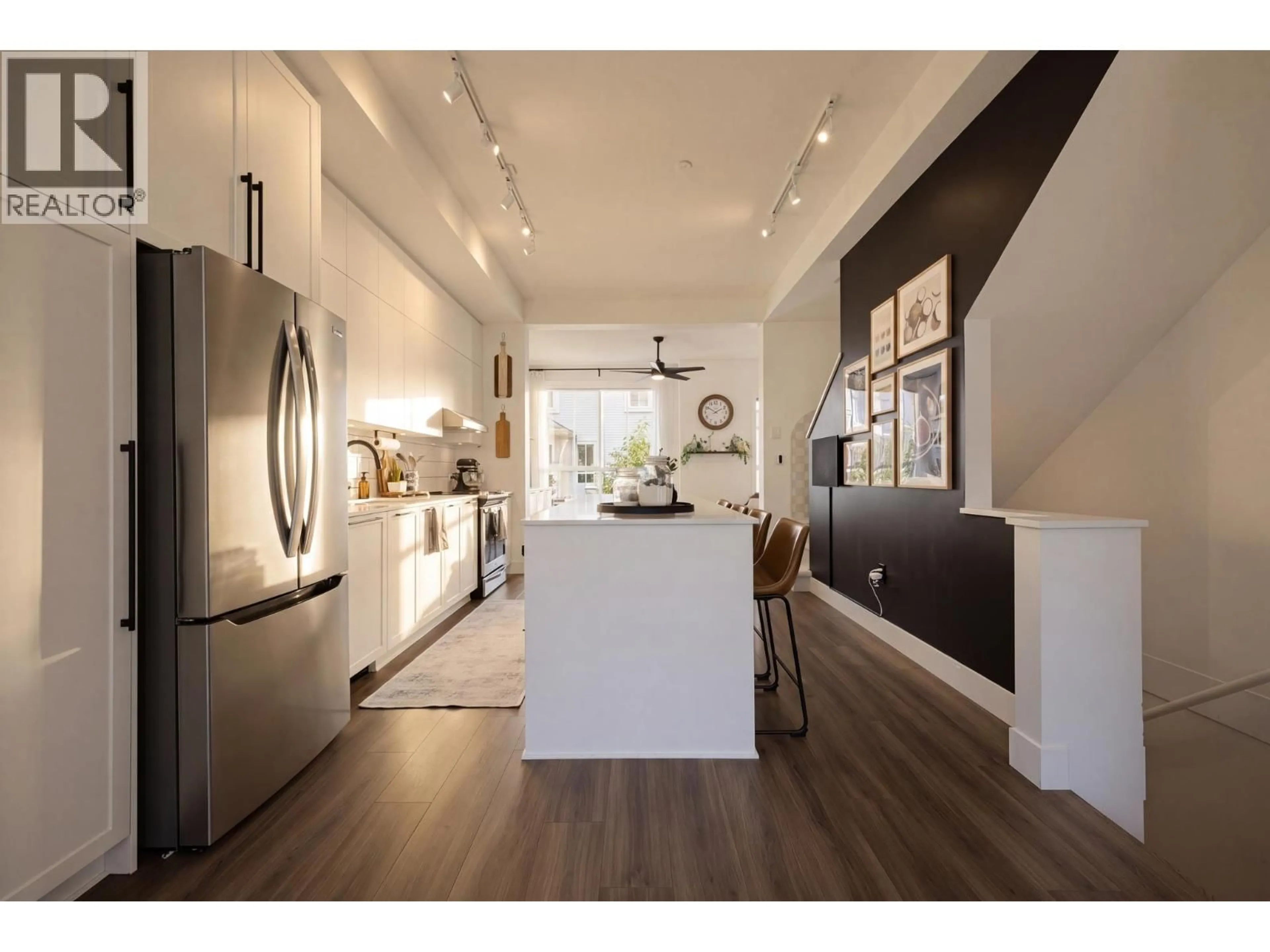 Open concept kitchen, wood/laminate floor for 52 - 4656 ORCA WAY, Tsawwassen British Columbia V4M0C9