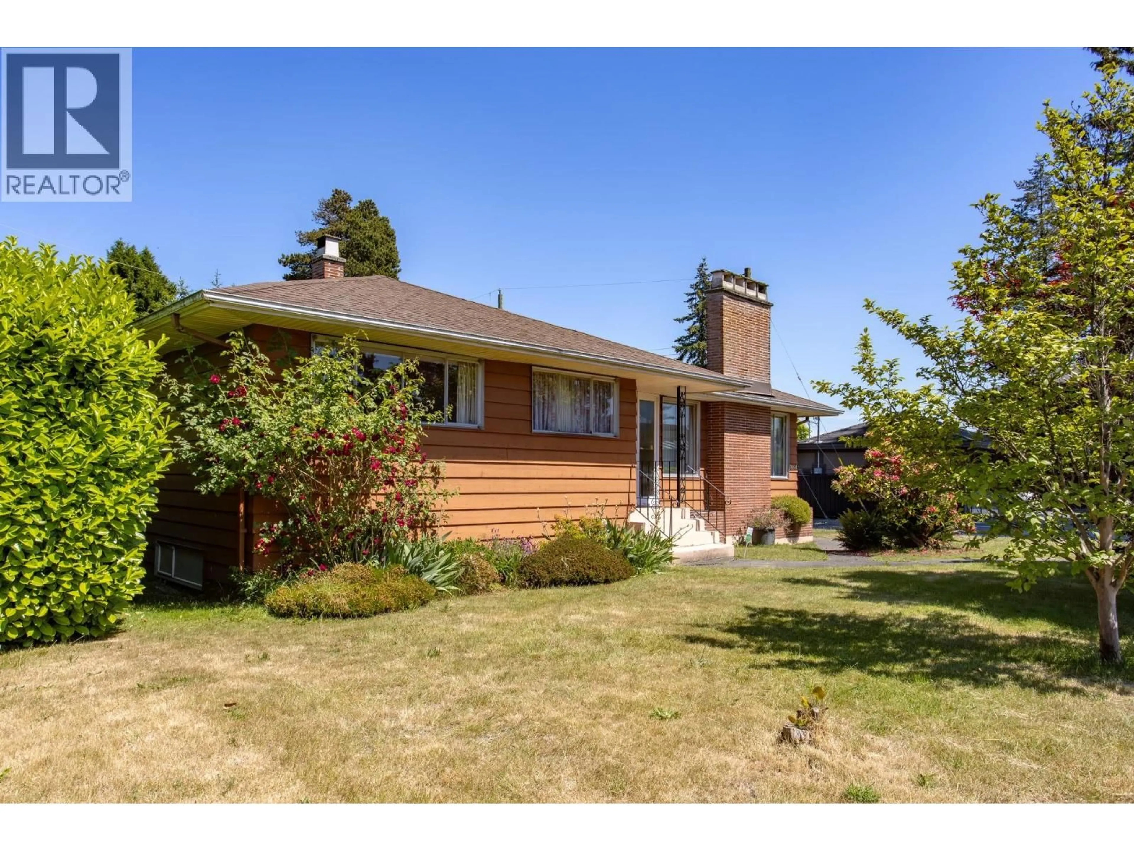 Home with brick exterior material, street for 7864 LANGLEY STREET, Burnaby British Columbia V3N3Z8