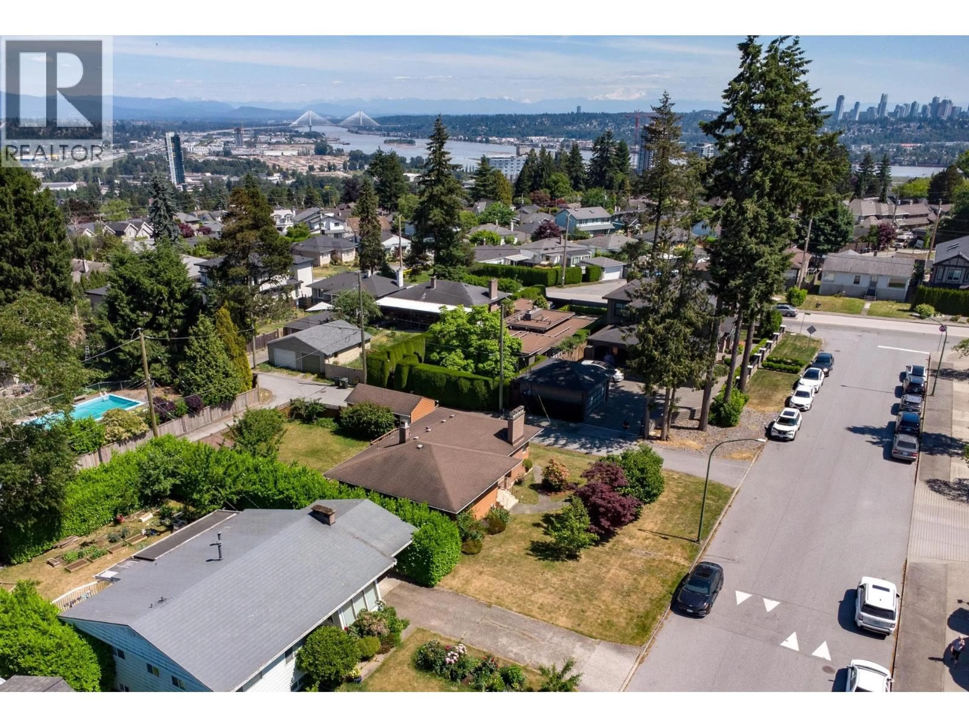 A pic from outside/outdoor area/front of a property/back of a property/a pic from drone, mountain view for 7864 LANGLEY STREET, Burnaby British Columbia V3N3Z8