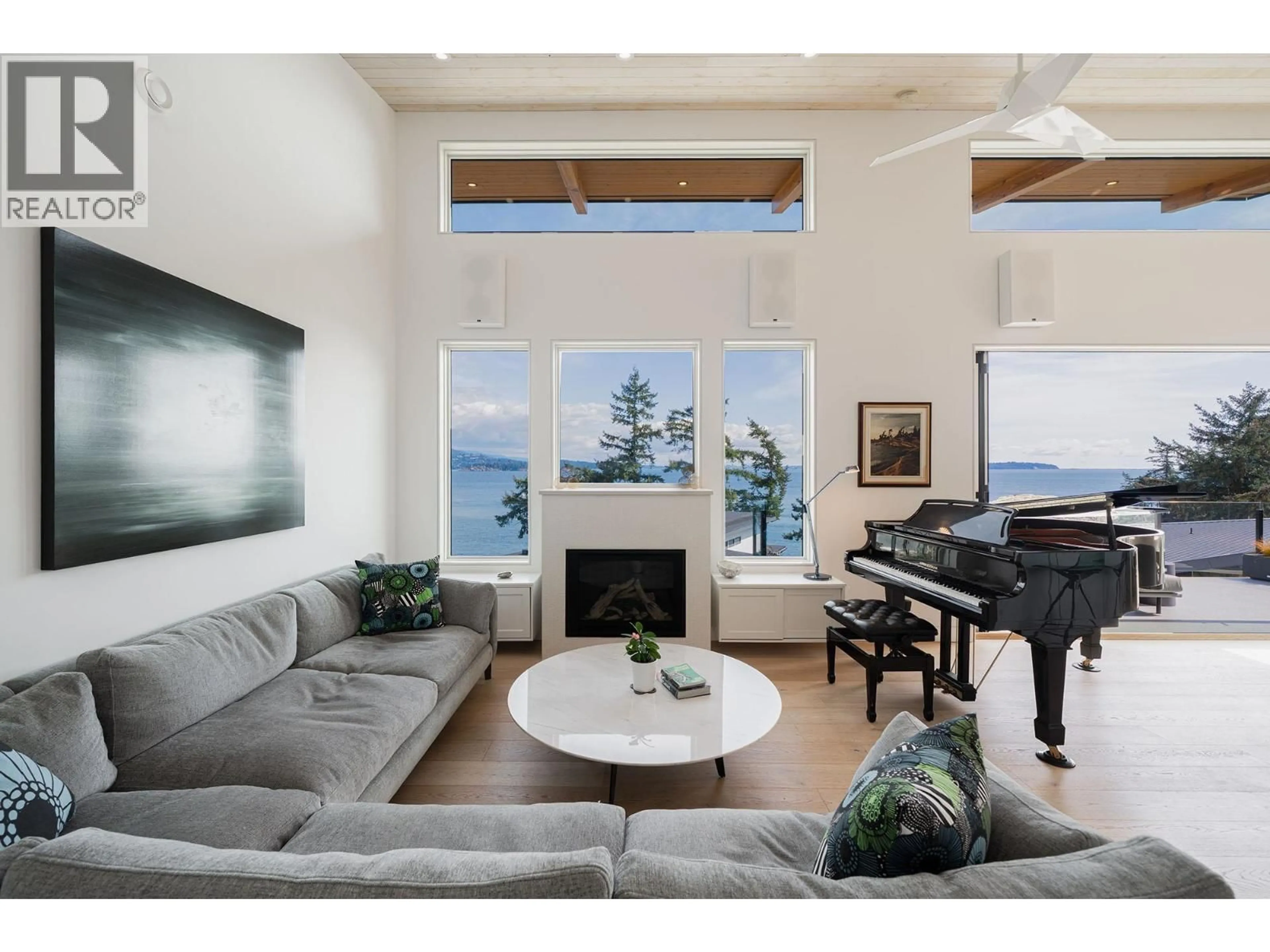Living room with furniture, wood/laminate floor for 242 SHORE LANE, Bowen Island British Columbia V0N1G2