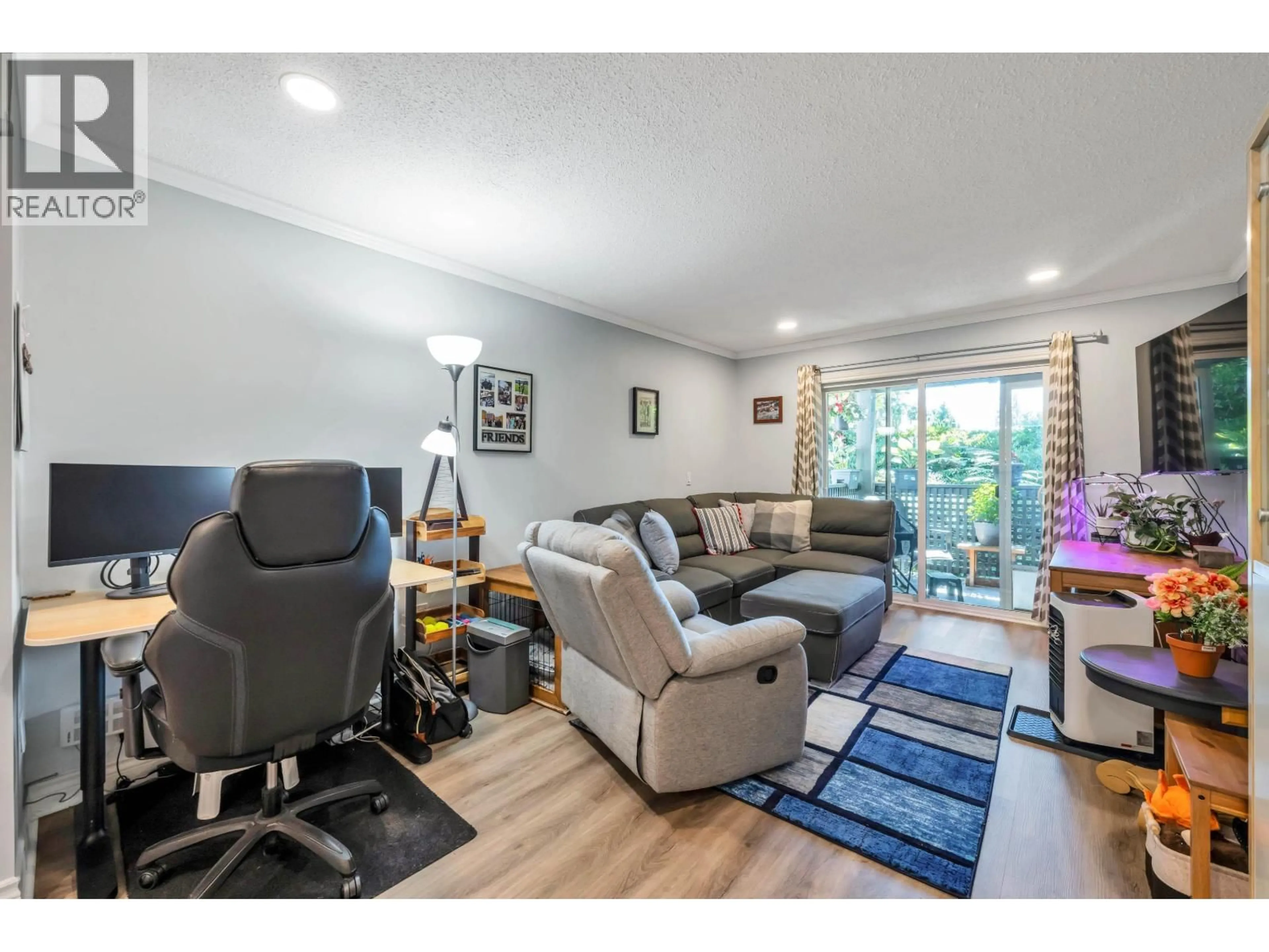 Living room with furniture, wood/laminate floor for 117 - 200 WESTHILL PLACE, Port Moody British Columbia V3H1V2