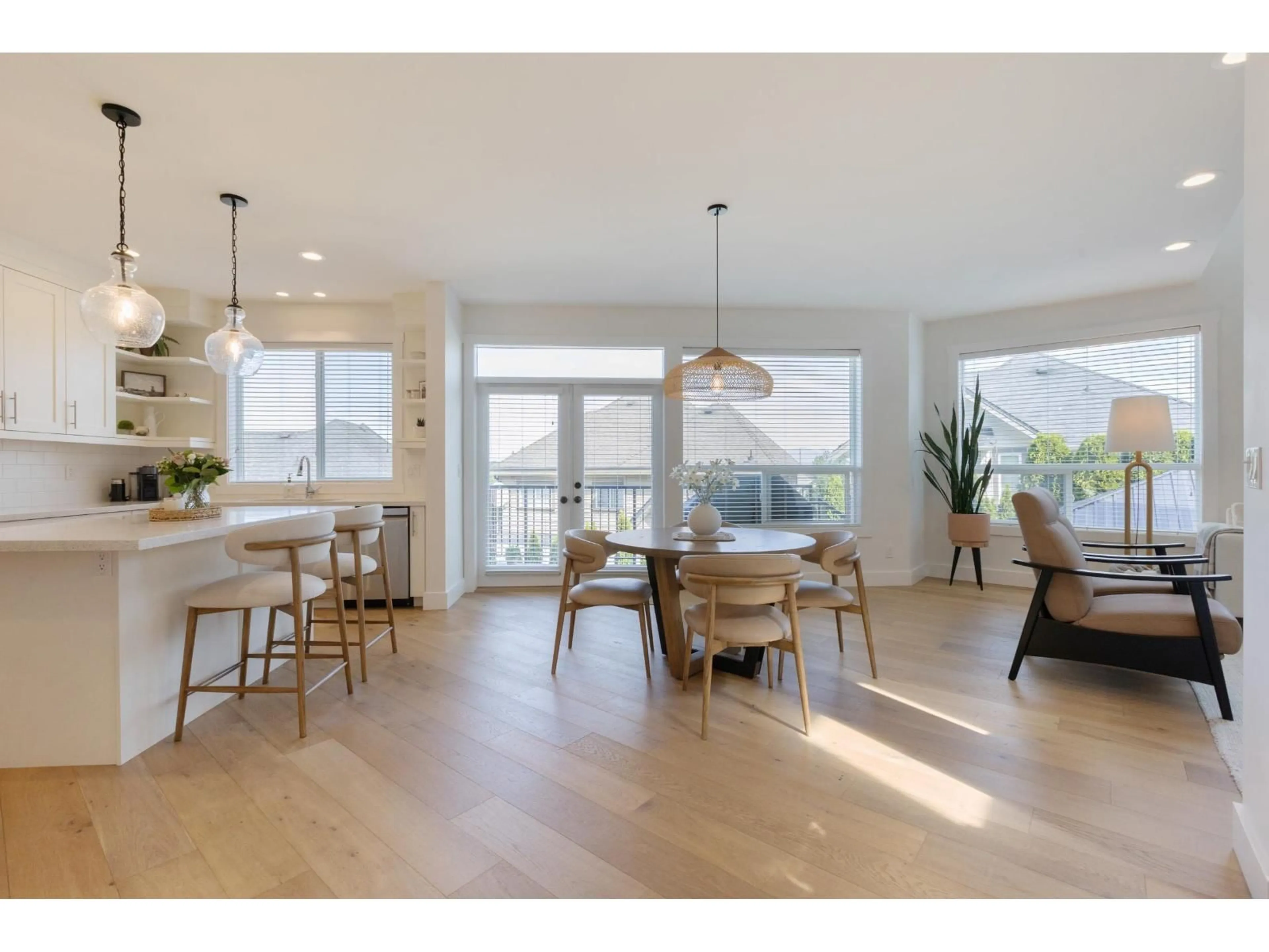 Open concept kitchen, wood/laminate floor for 17851 71 AVENUE, Surrey British Columbia V3S7C7