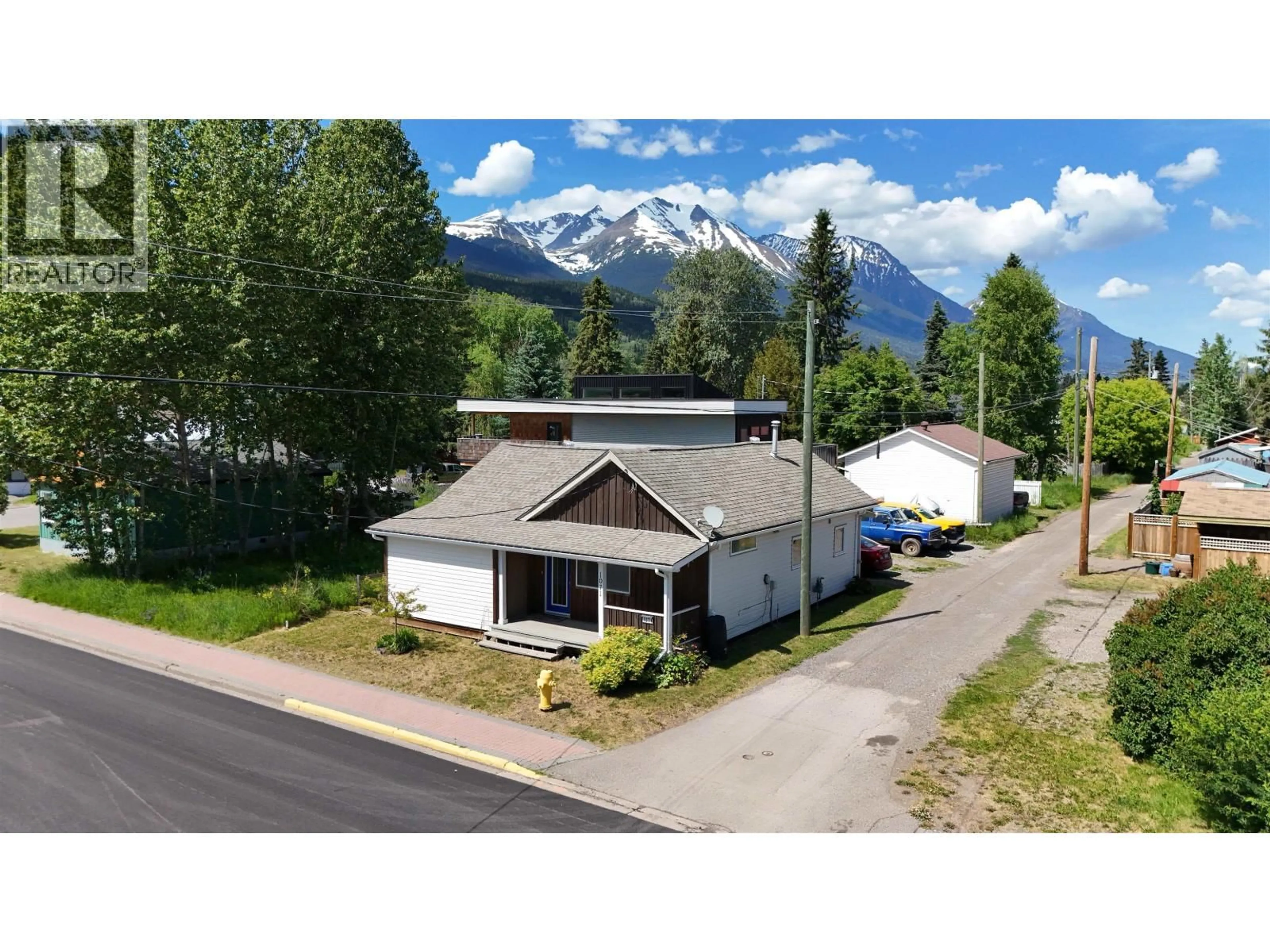 A pic from outside/outdoor area/front of a property/back of a property/a pic from drone, mountain view for 1071 QUEEN STREET, Smithers British Columbia V0J2N0