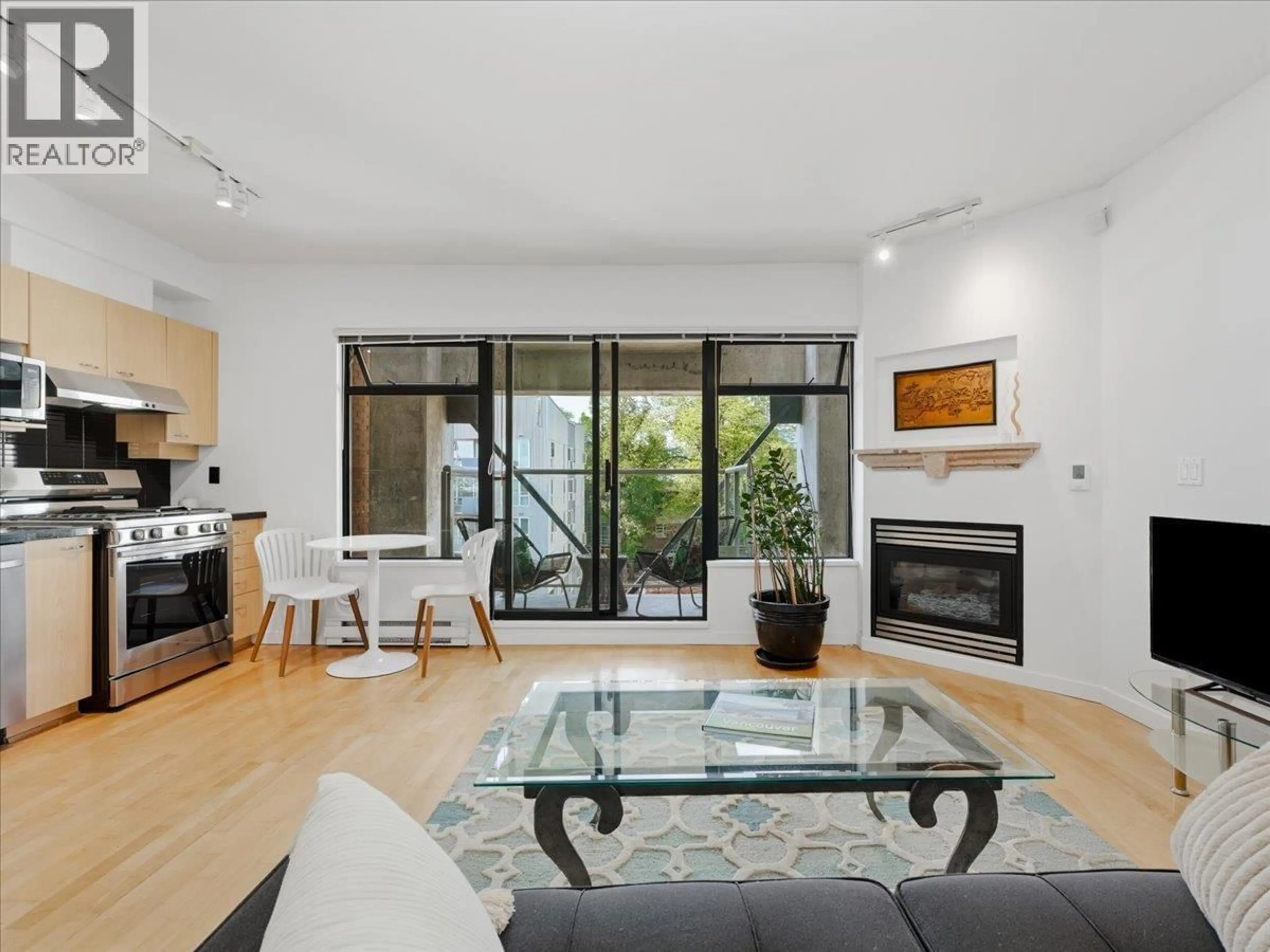 Living room with furniture, unknown for 503 - 2228 MARSTRAND AVENUE, Vancouver British Columbia V6K4T1