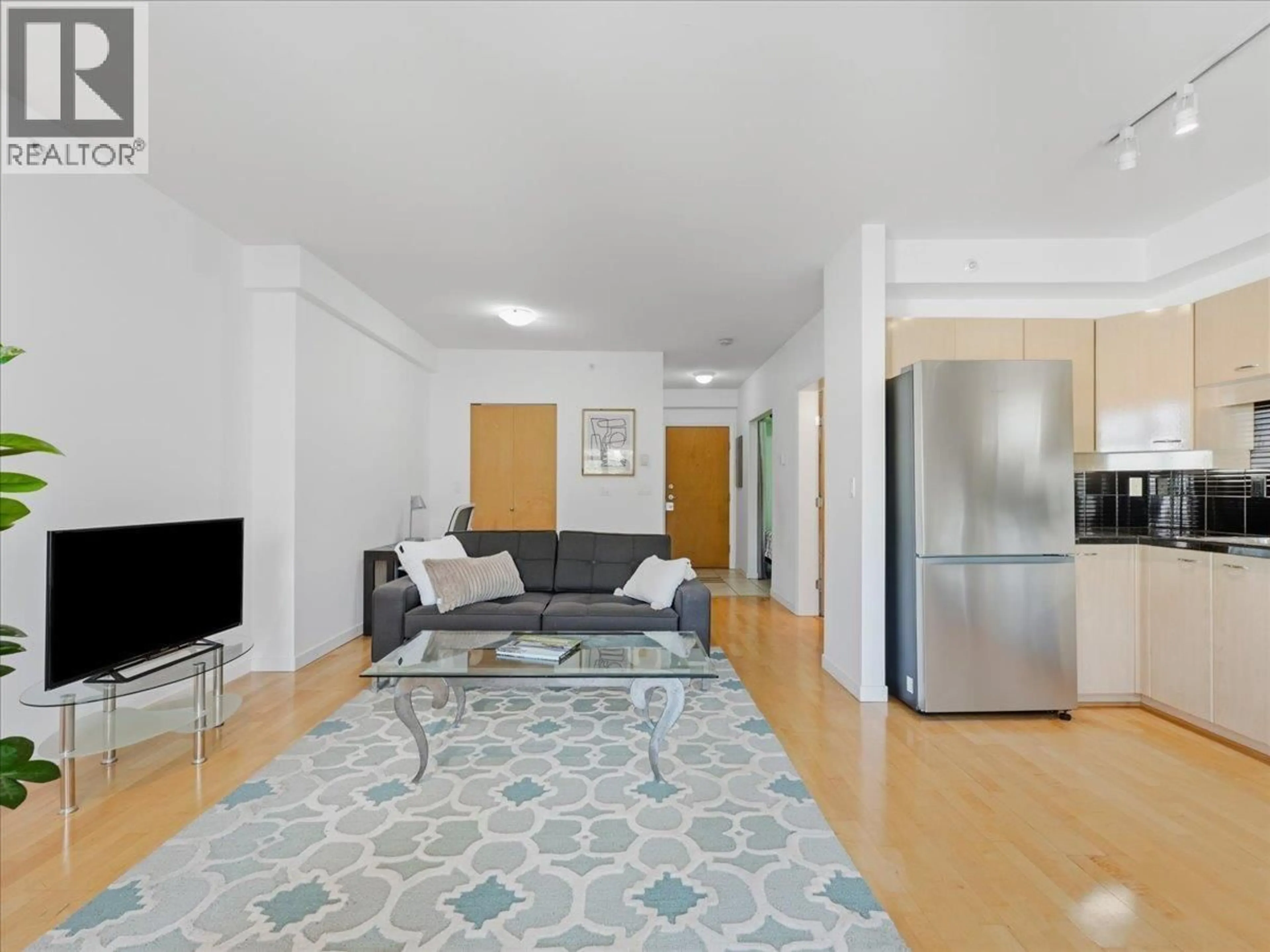 Living room with furniture, unknown for 503 - 2228 MARSTRAND AVENUE, Vancouver British Columbia V6K4T1