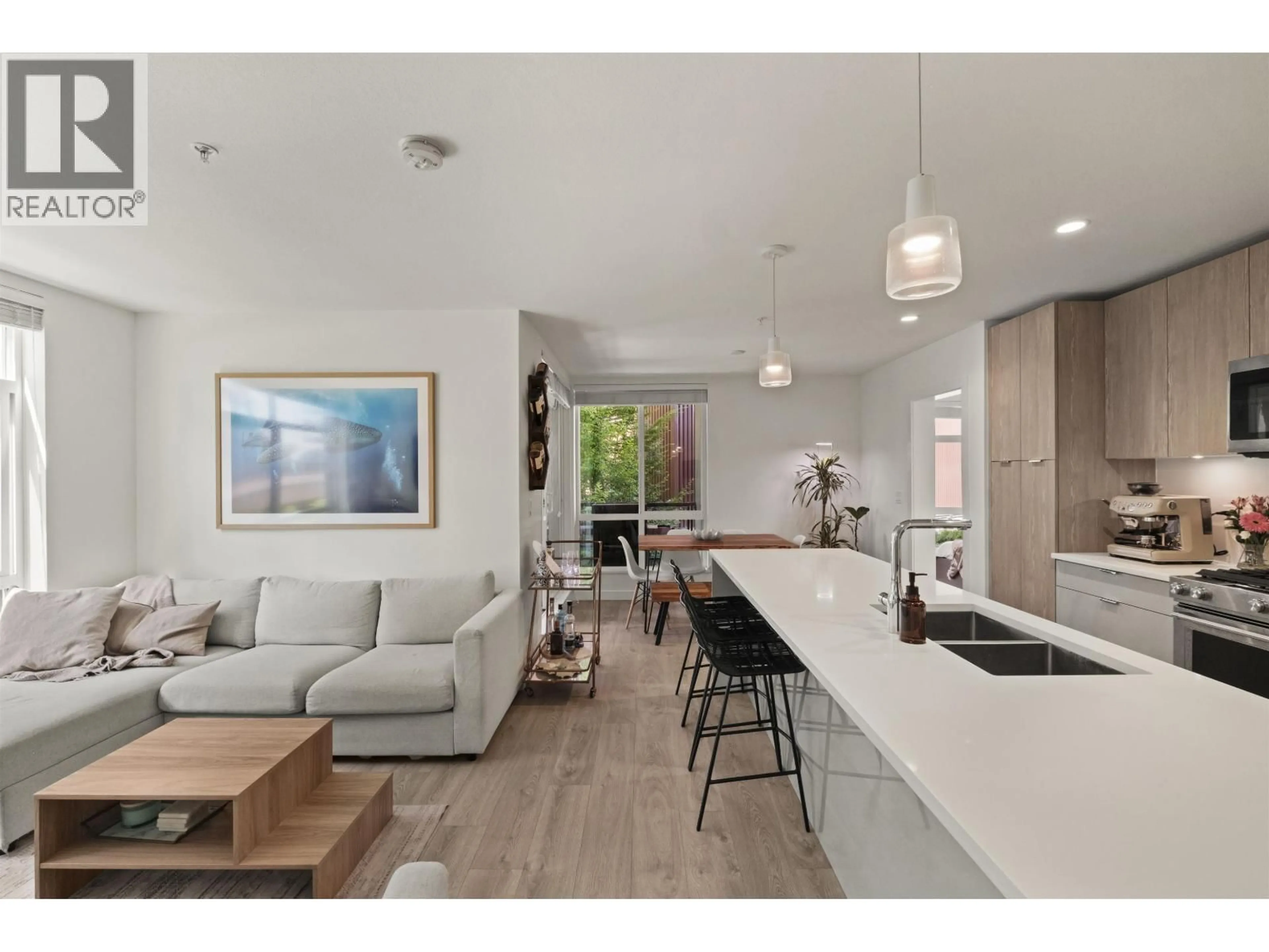 Open concept kitchen, unknown for 209 - 128 8TH STREET, North Vancouver British Columbia V7L0H2