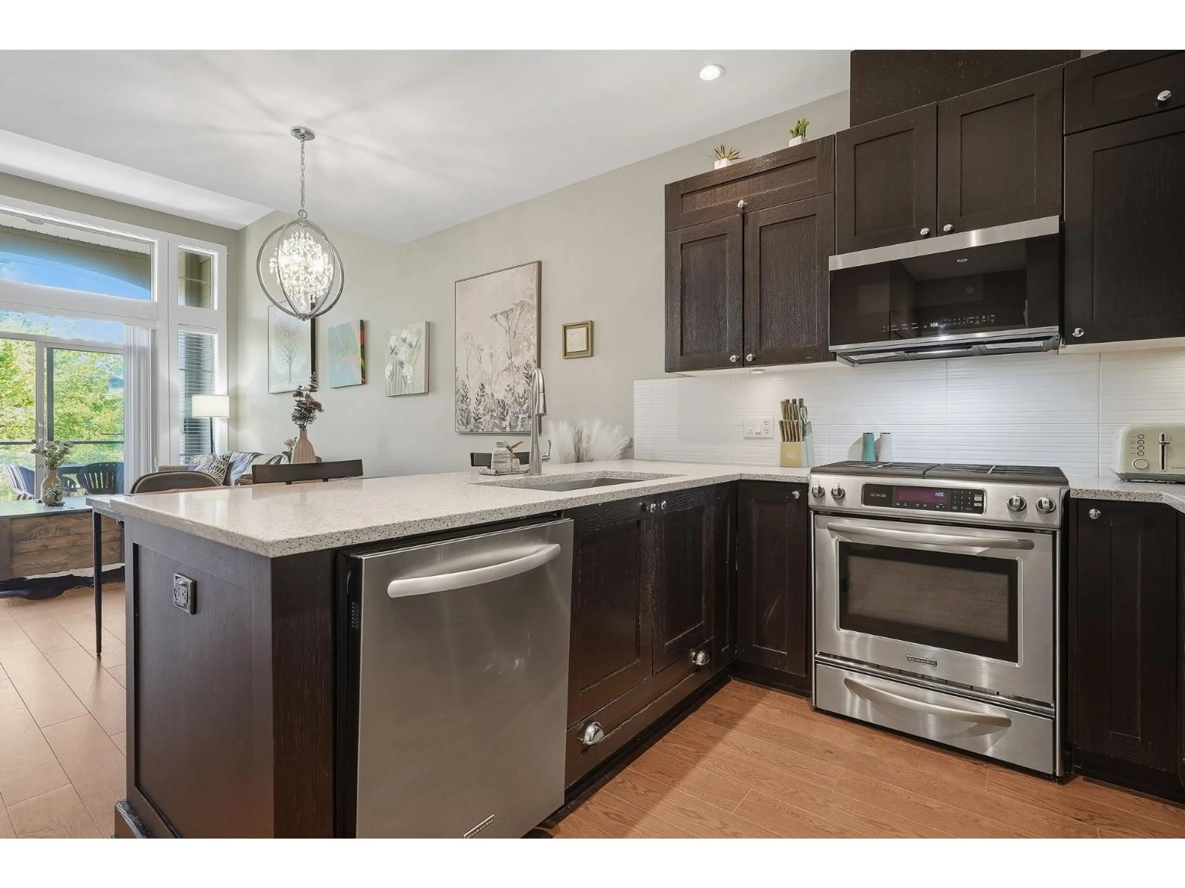 Open concept kitchen, unknown for 307 - 15195 36 AVENUE, Surrey British Columbia V3Z4R3