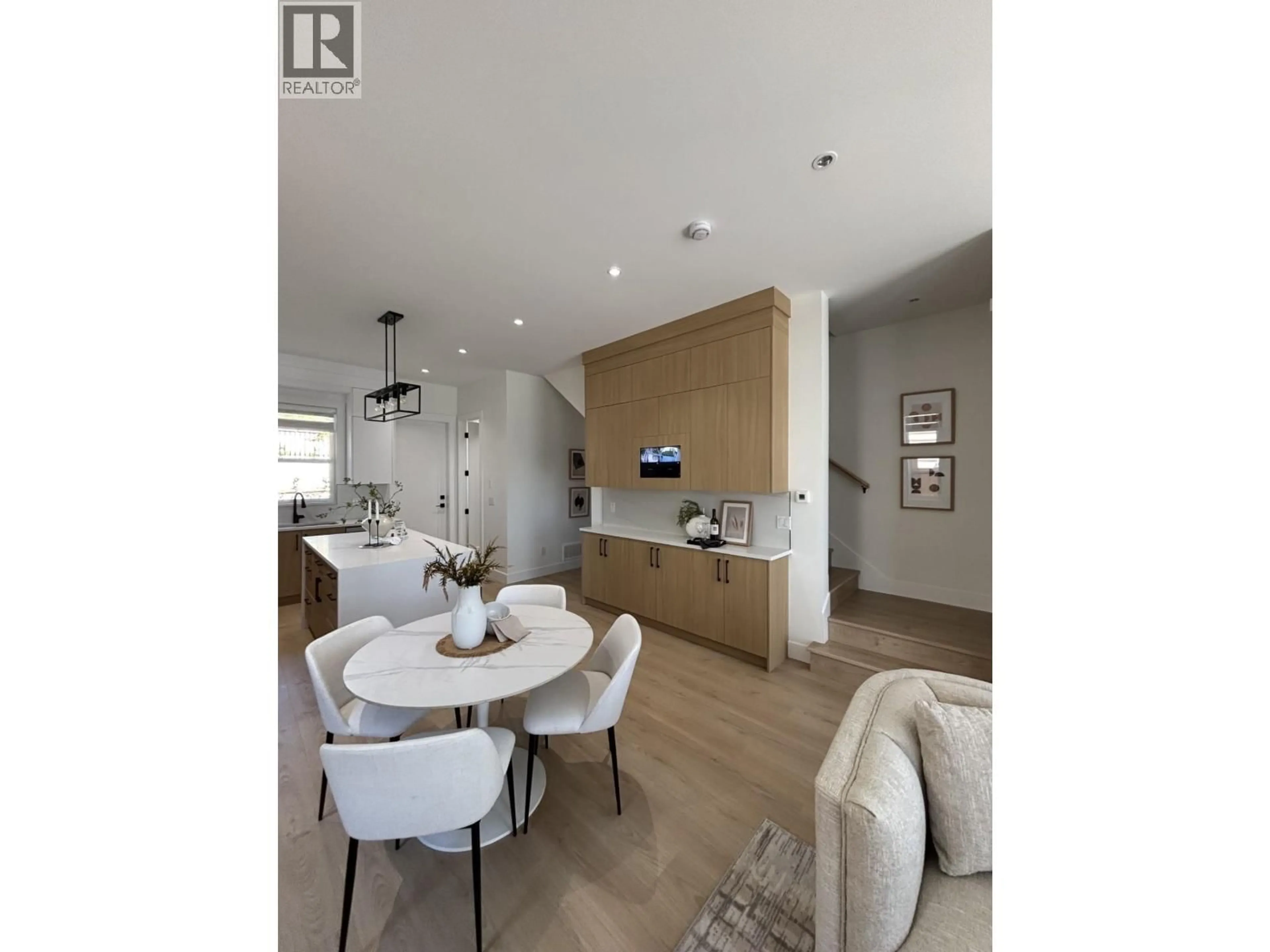 Open concept kitchen, wood/laminate floor for 102 - 957 EDGAR AVENUE, Coquitlam British Columbia V3K2K1