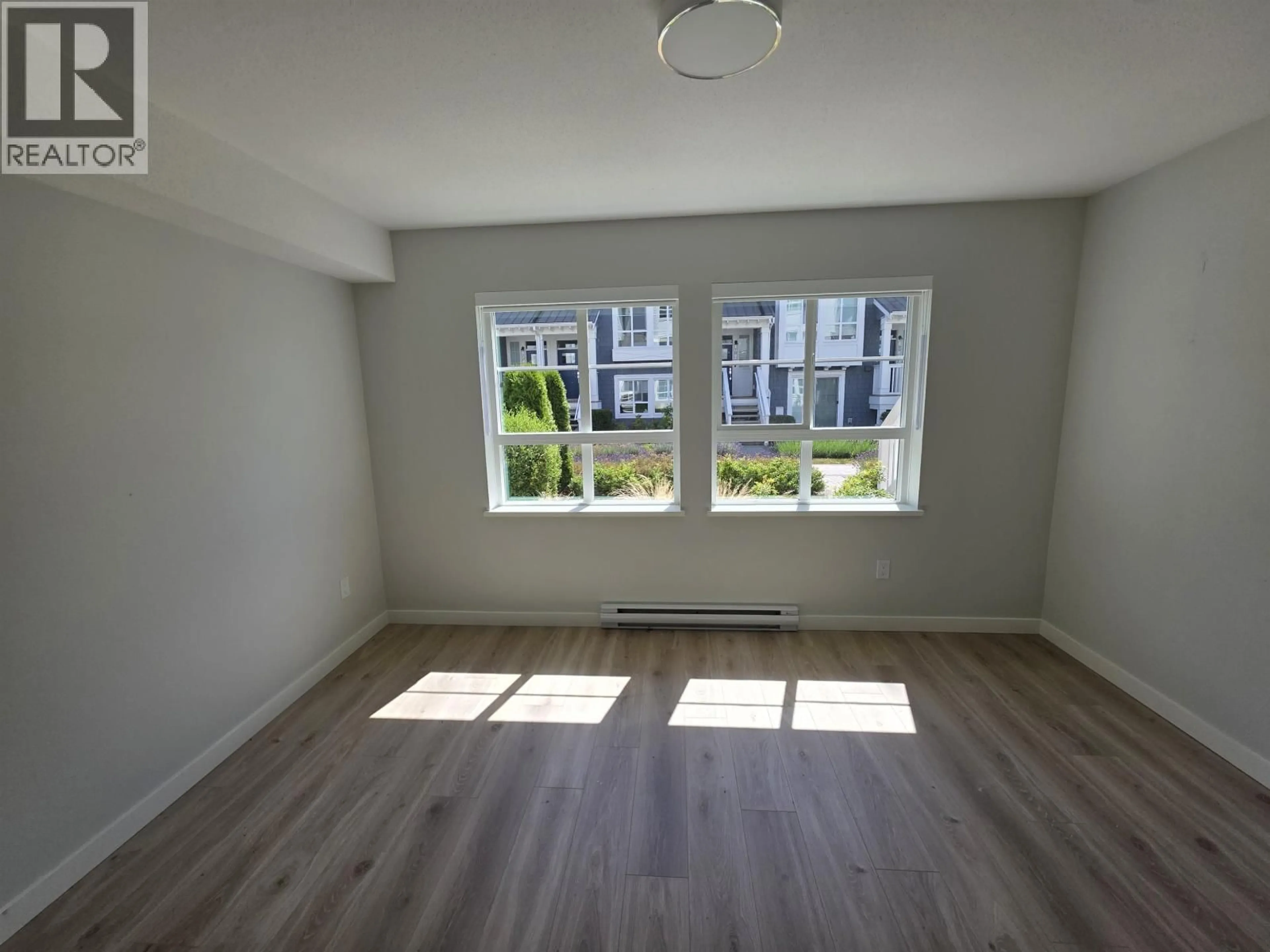 A pic of a room for 59 - 5311 ADMIRAL WAY, Delta British Columbia V4K0E2